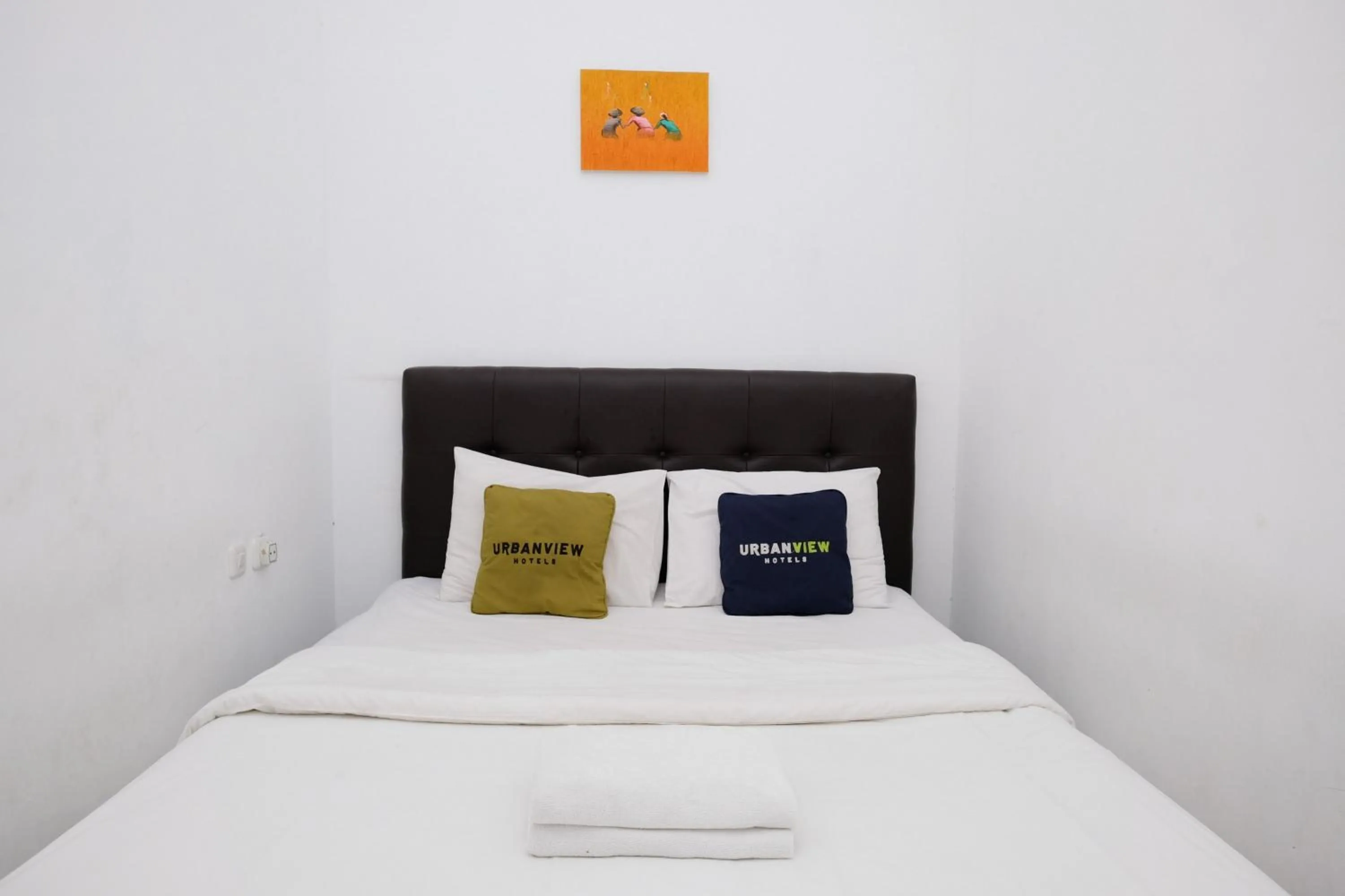 Bedroom, Bed in Urbanview Hotel Dommy Yogyakarta by RedDoorz