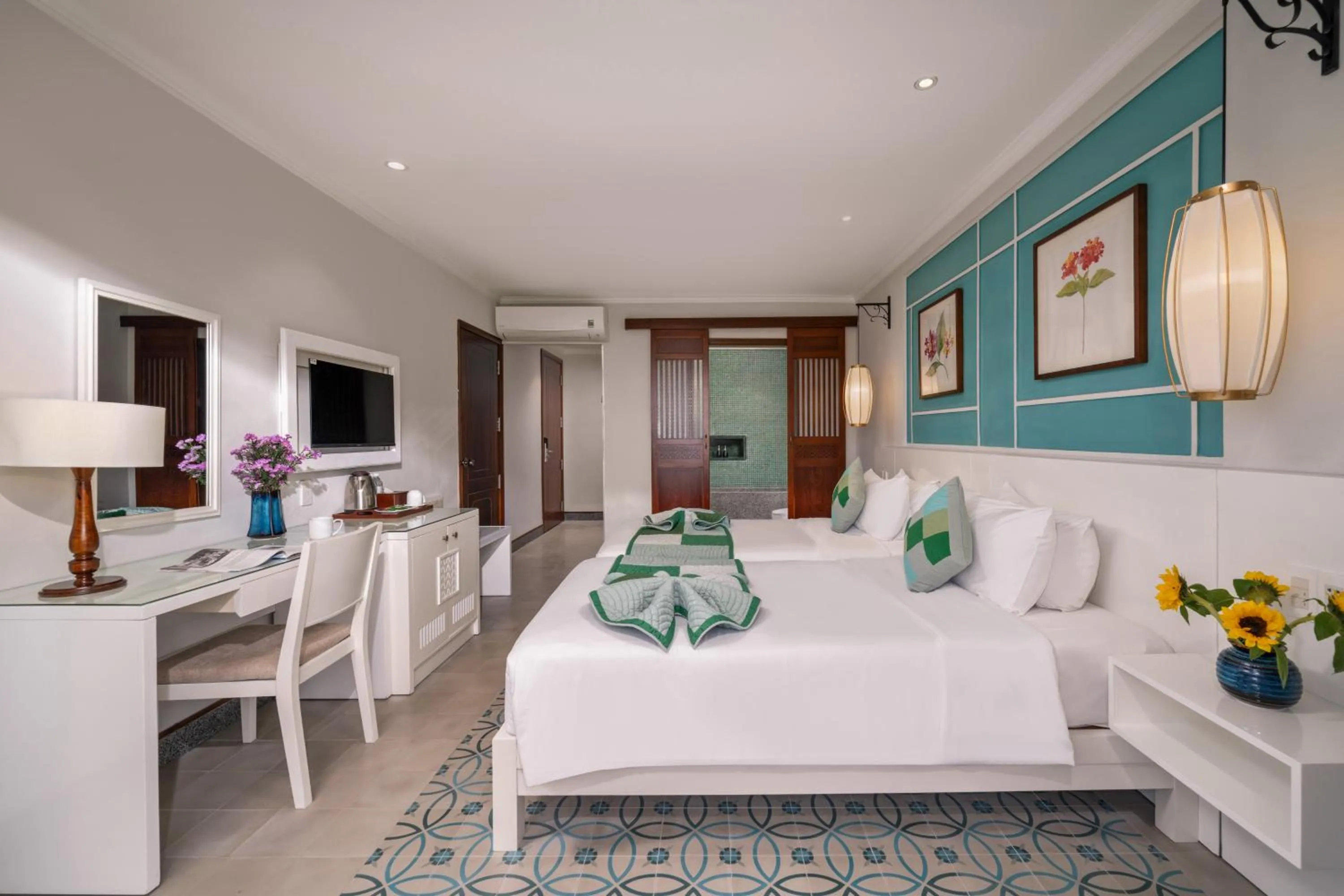 Bed in Lantana Boutique Hoi An Hotel