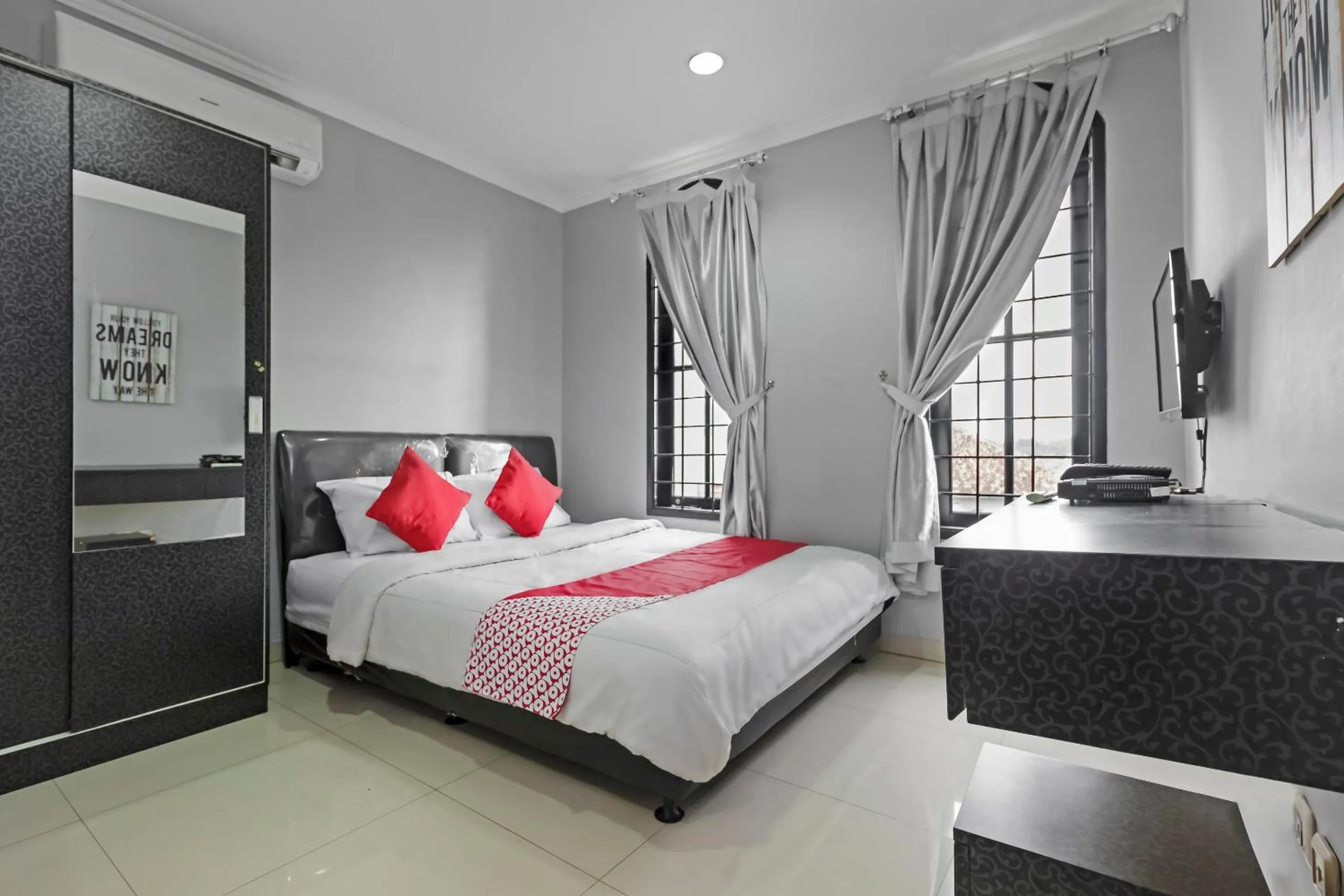 Photo of the whole room, Bed in Collection O Pondok Indah Near Gandaria City Formerly Lamaison Residence