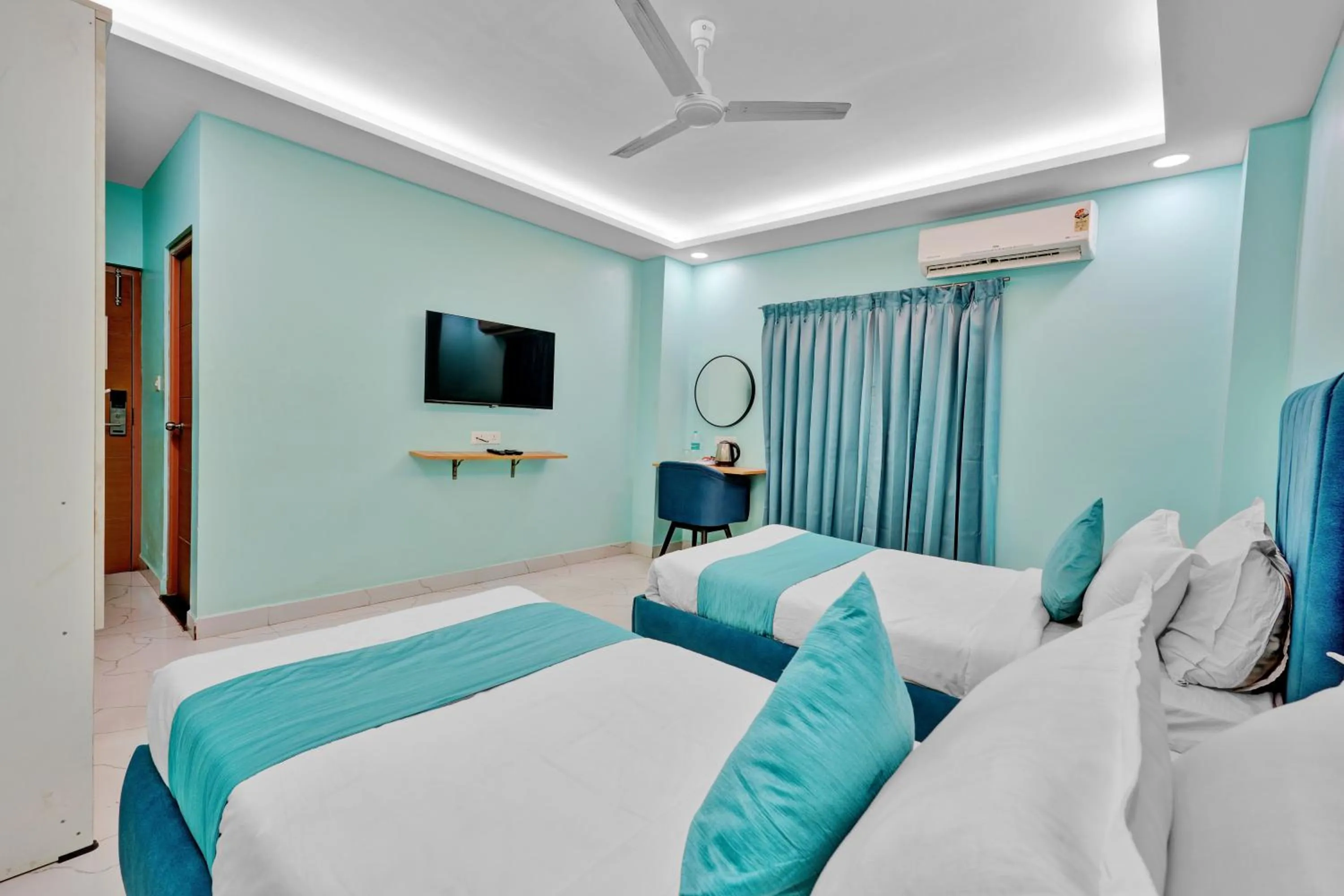 Bed in Rohaan Hotels Medavakkam by UPAR