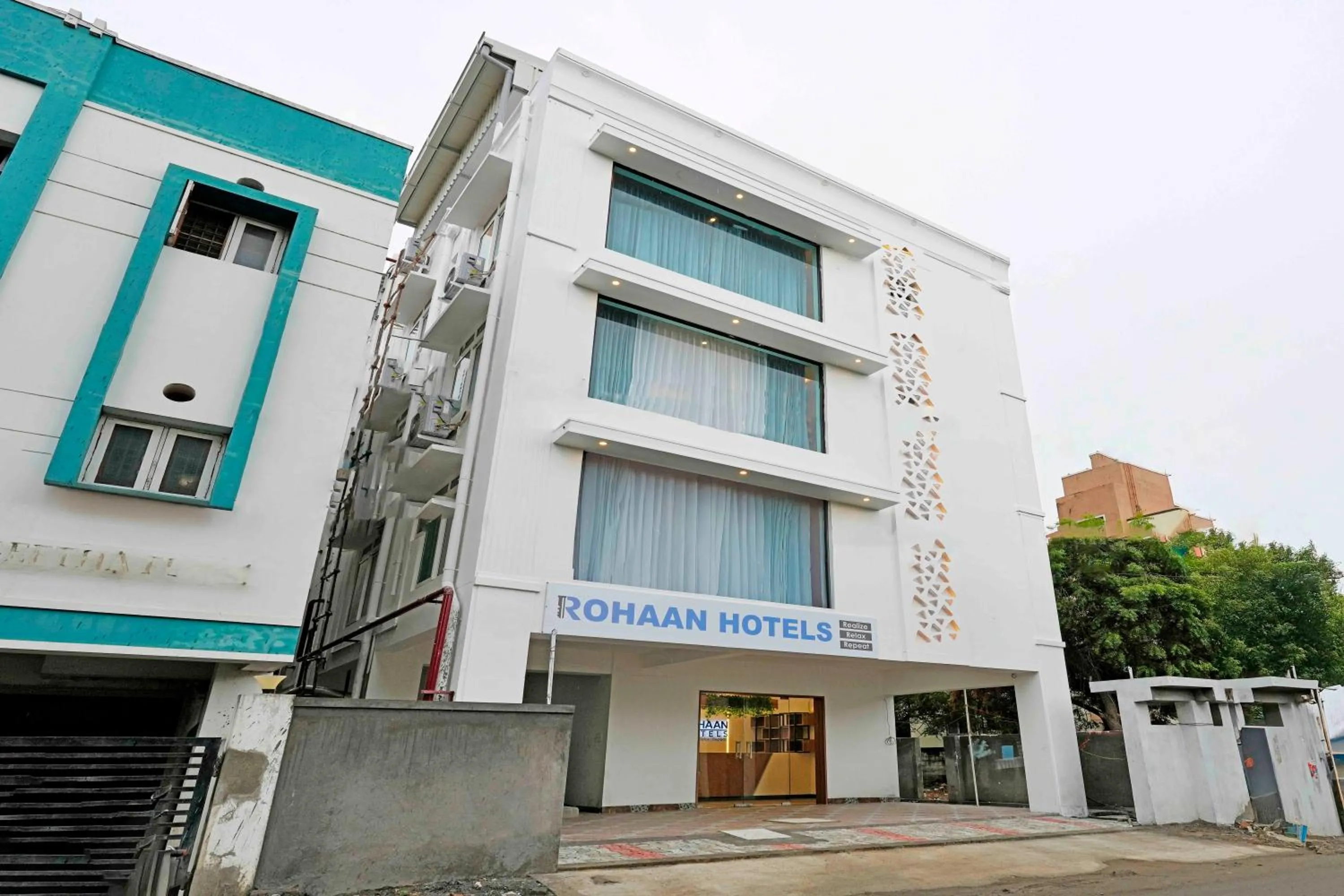 Facade/entrance in Rohaan Hotels Medavakkam by UPAR