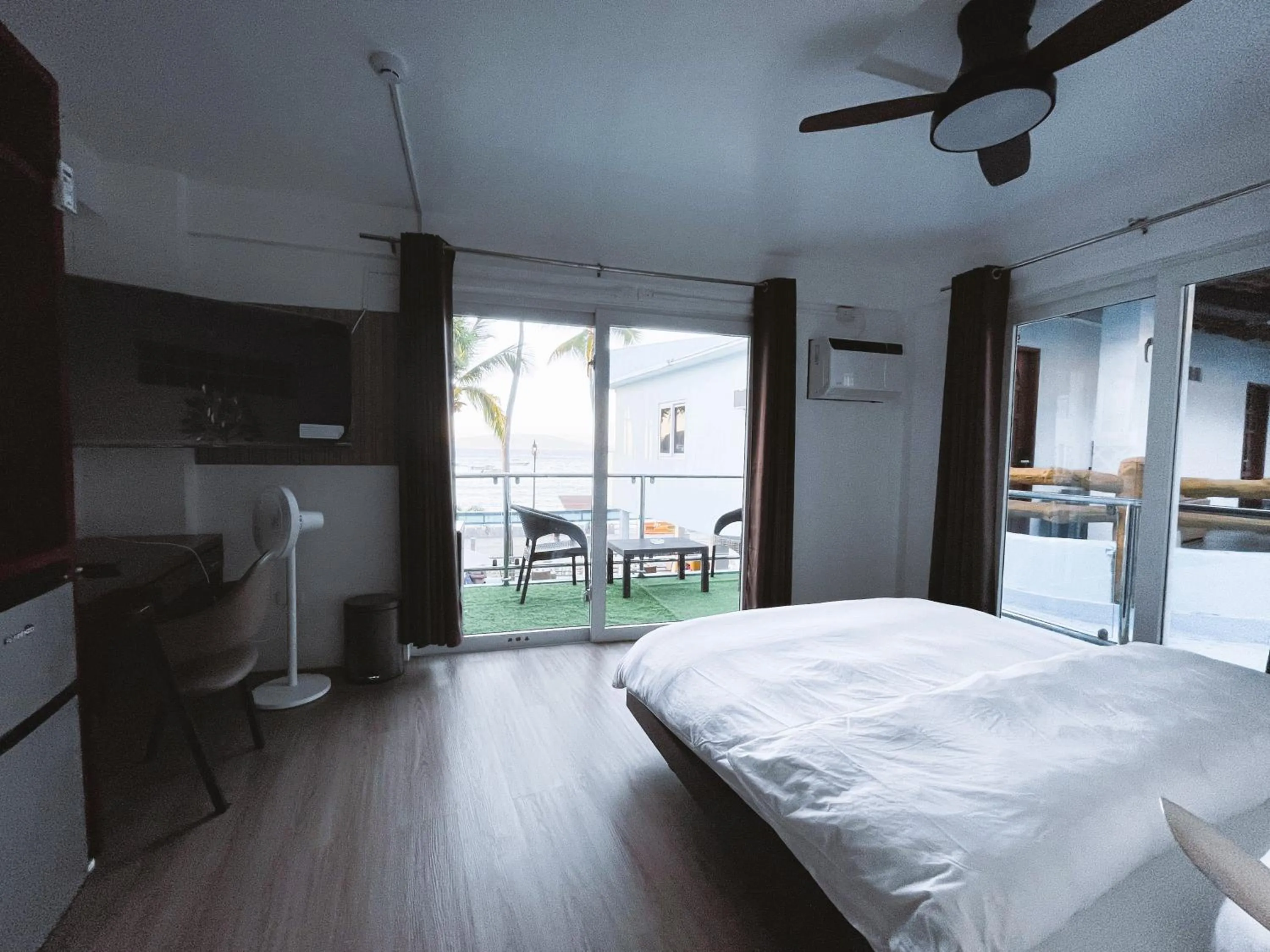 Photo of the whole room, Bed in Montani Beach Resort Puerto Galera powered by Cocotel