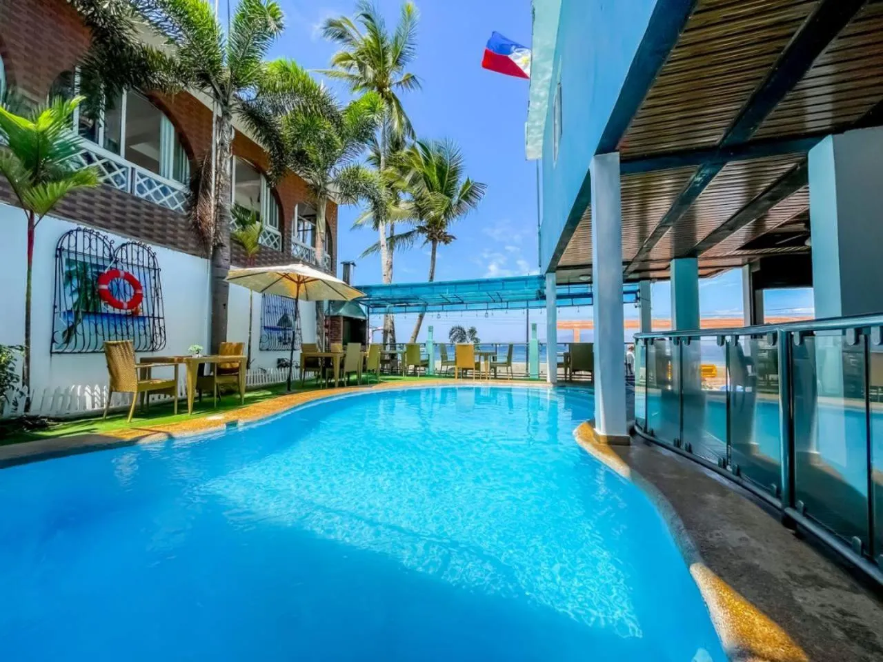 Swimming pool in Montani Beach Resort Puerto Galera powered by Cocotel