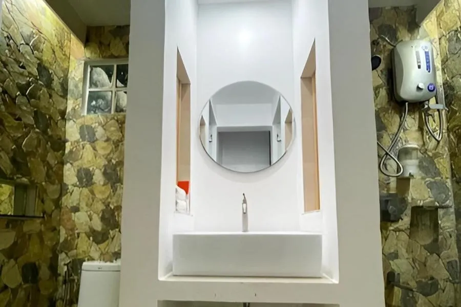 Bathroom in Montani Beach Resort Puerto Galera powered by Cocotel