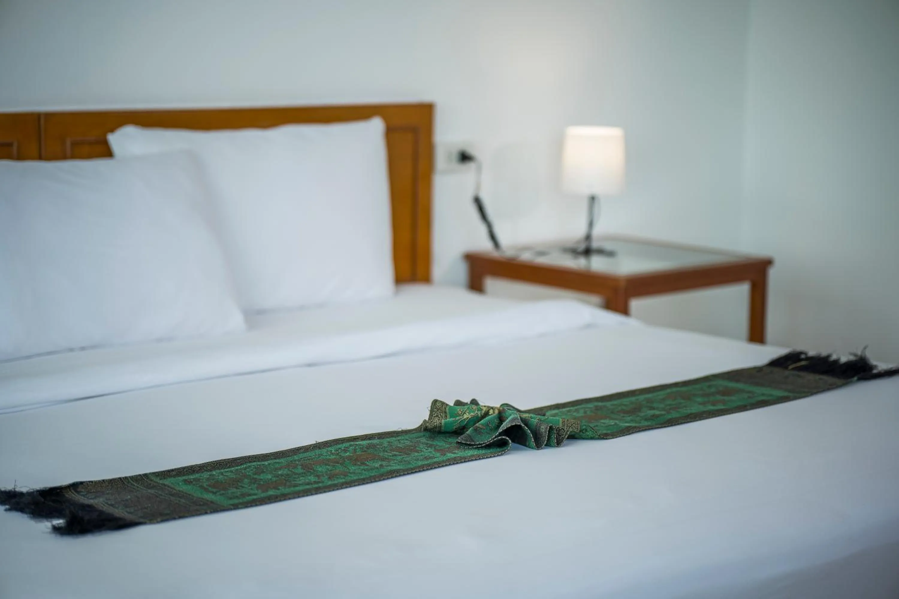 Bed in Mam Kaibae Hotel