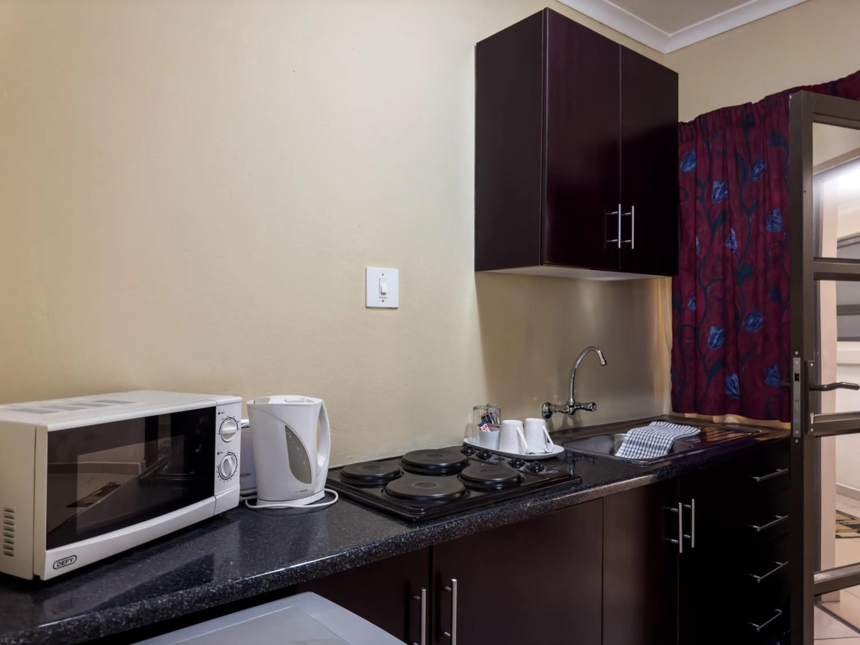 Kitchen or kitchenette in Tribute Guest House Matala