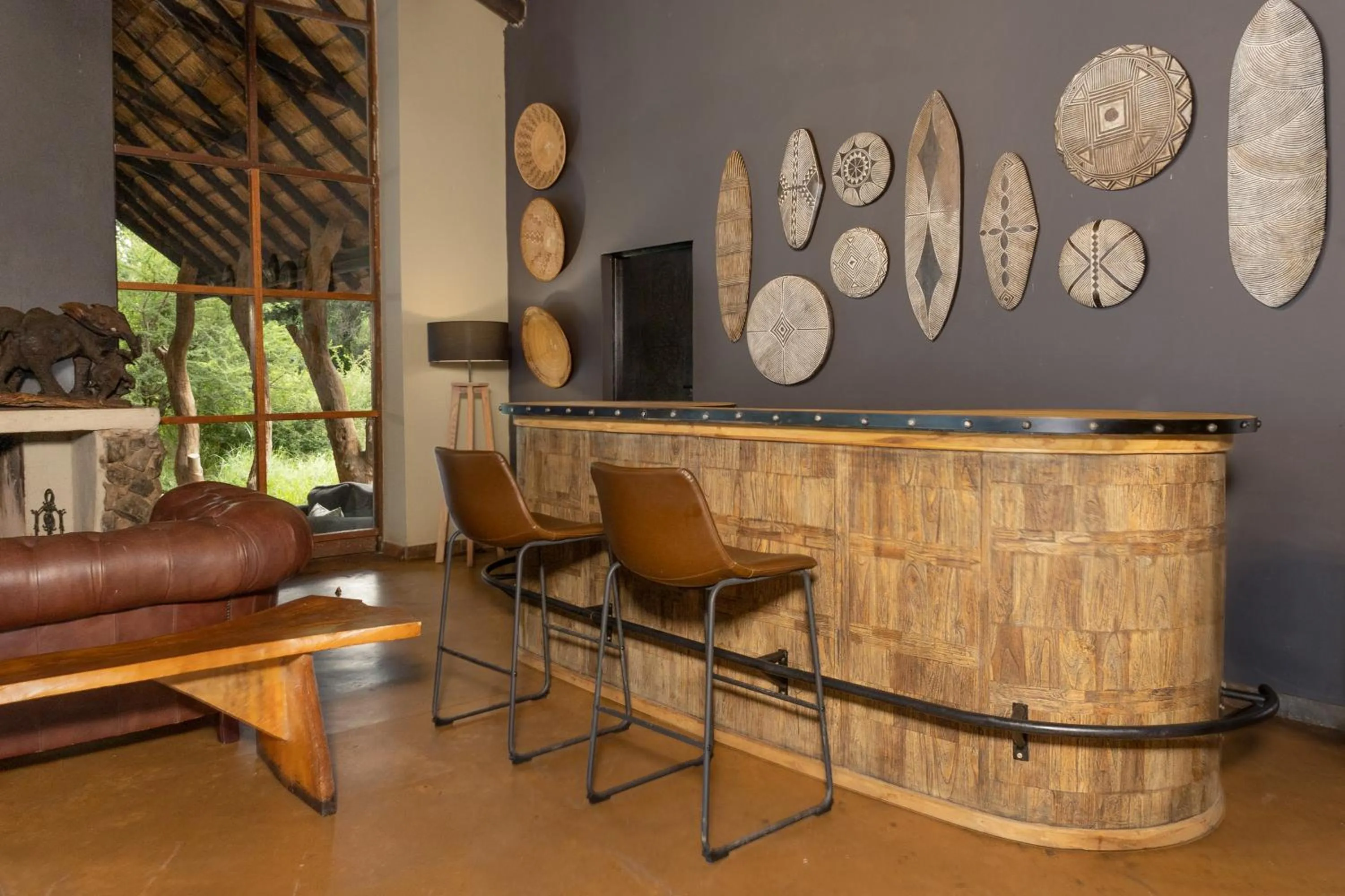 Lounge or bar in Black Rhino Game Lodge