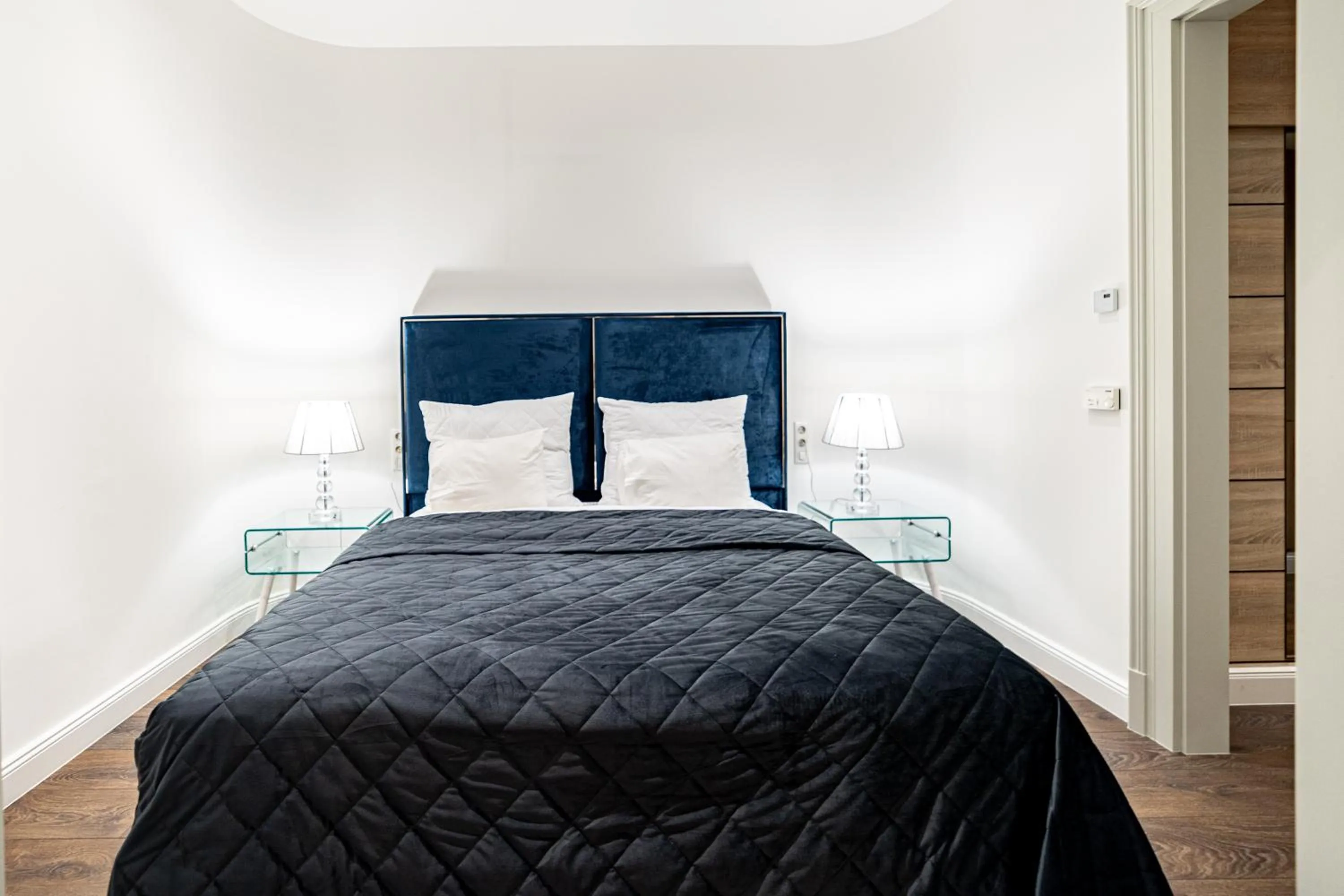 Bed in Kozmo Residences Budapest