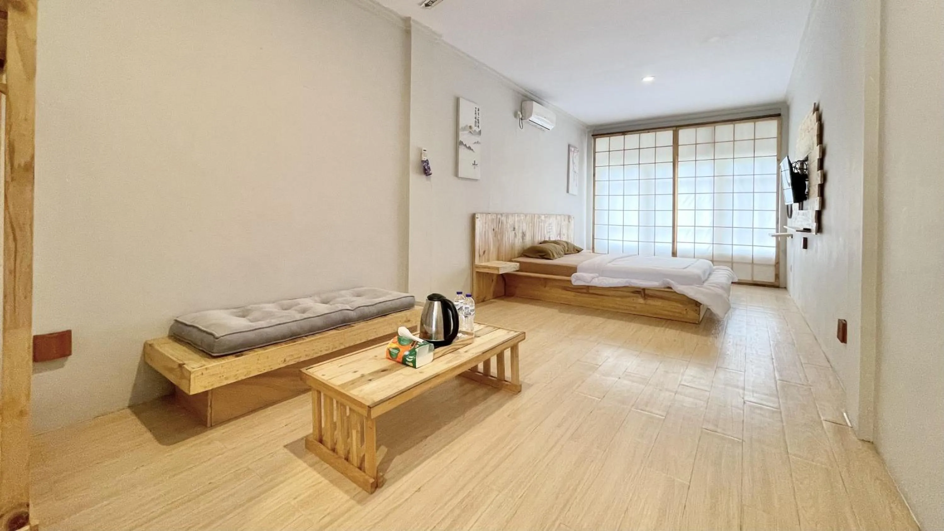 Bed in The Kanzi Hotel & Village