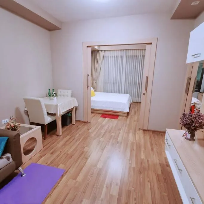 Photo of the whole room, Bed in Treasure Condo Kitchenette Wifi