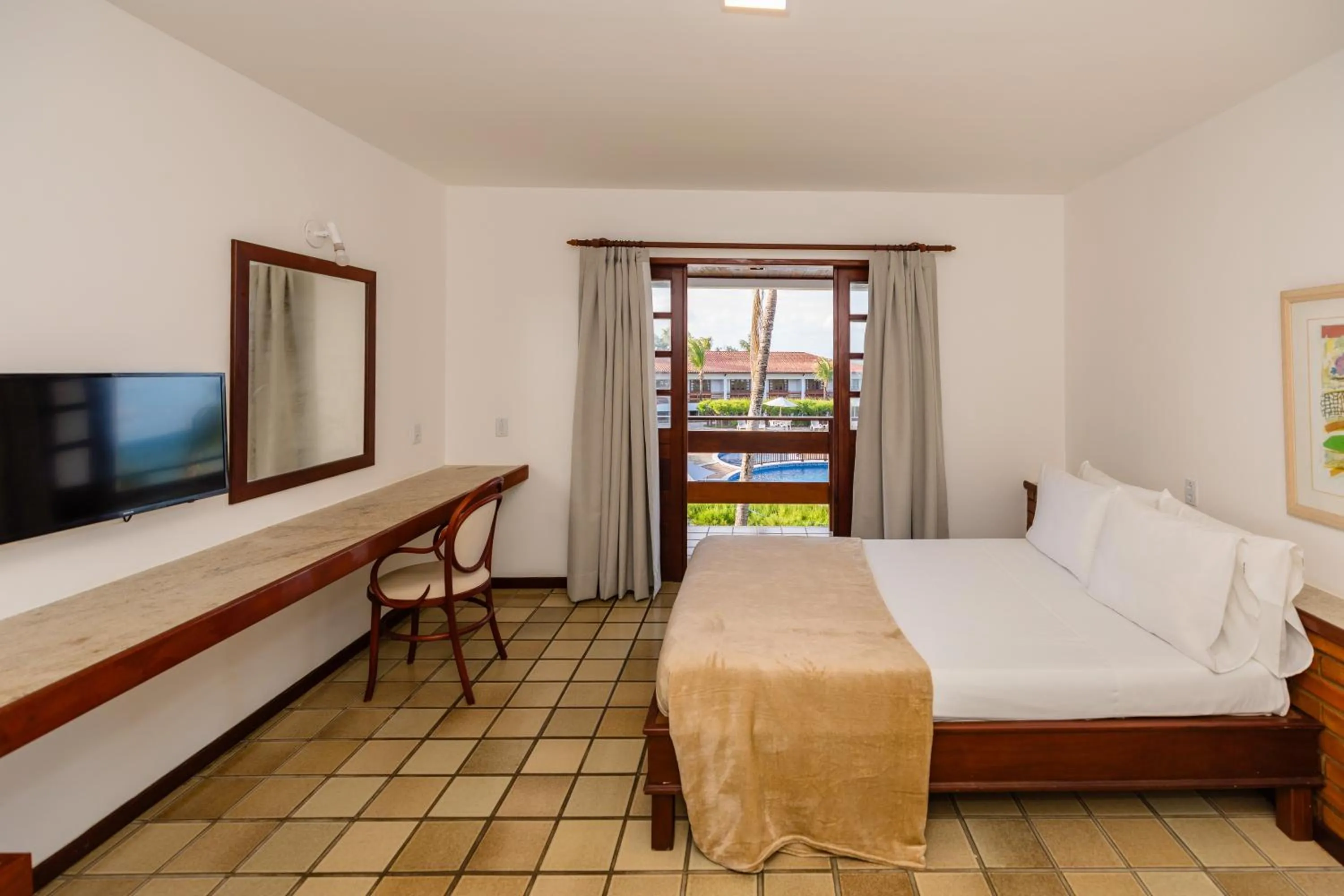 Bed in Mirai Beach Hotel