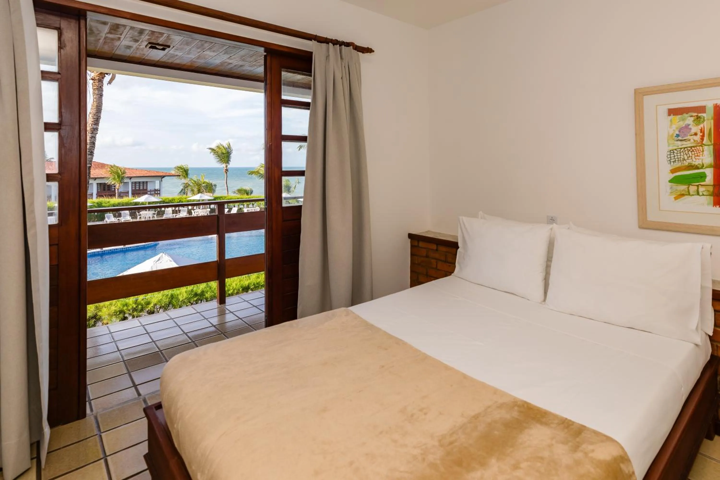 Bed in Mirai Beach Hotel