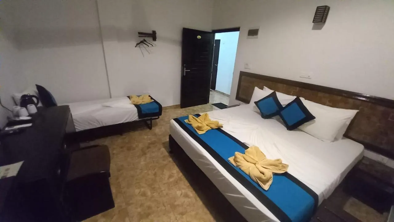 Bed in Blue Sand Beach Resort