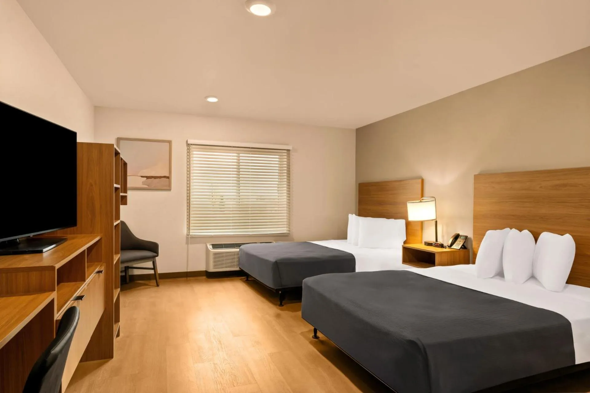 Bedroom, Bed in LivAway Suites Tri-Cities-Richland