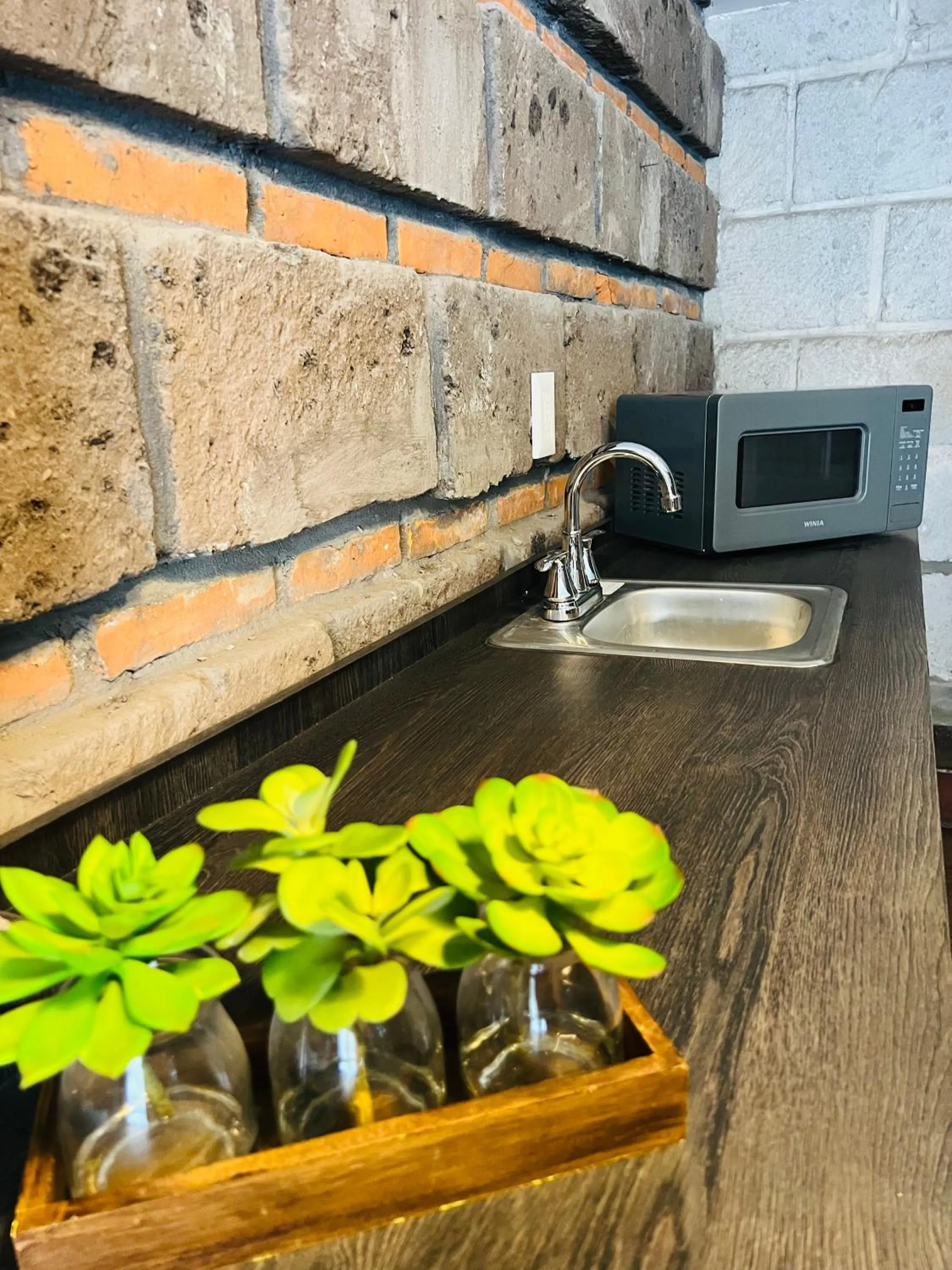 Kitchen or kitchenette in QA Hotel