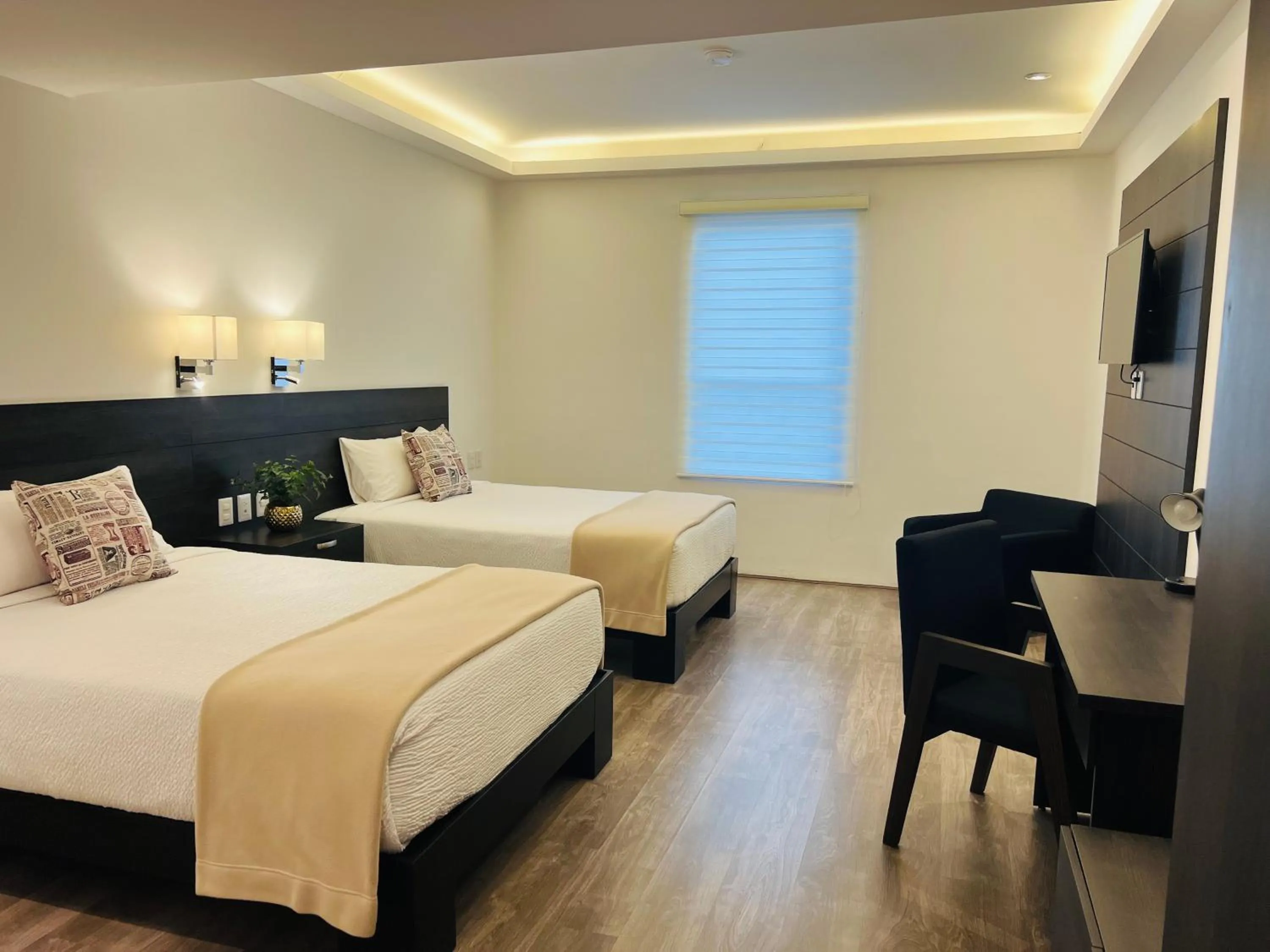 Bedroom, Bed in QA Hotel