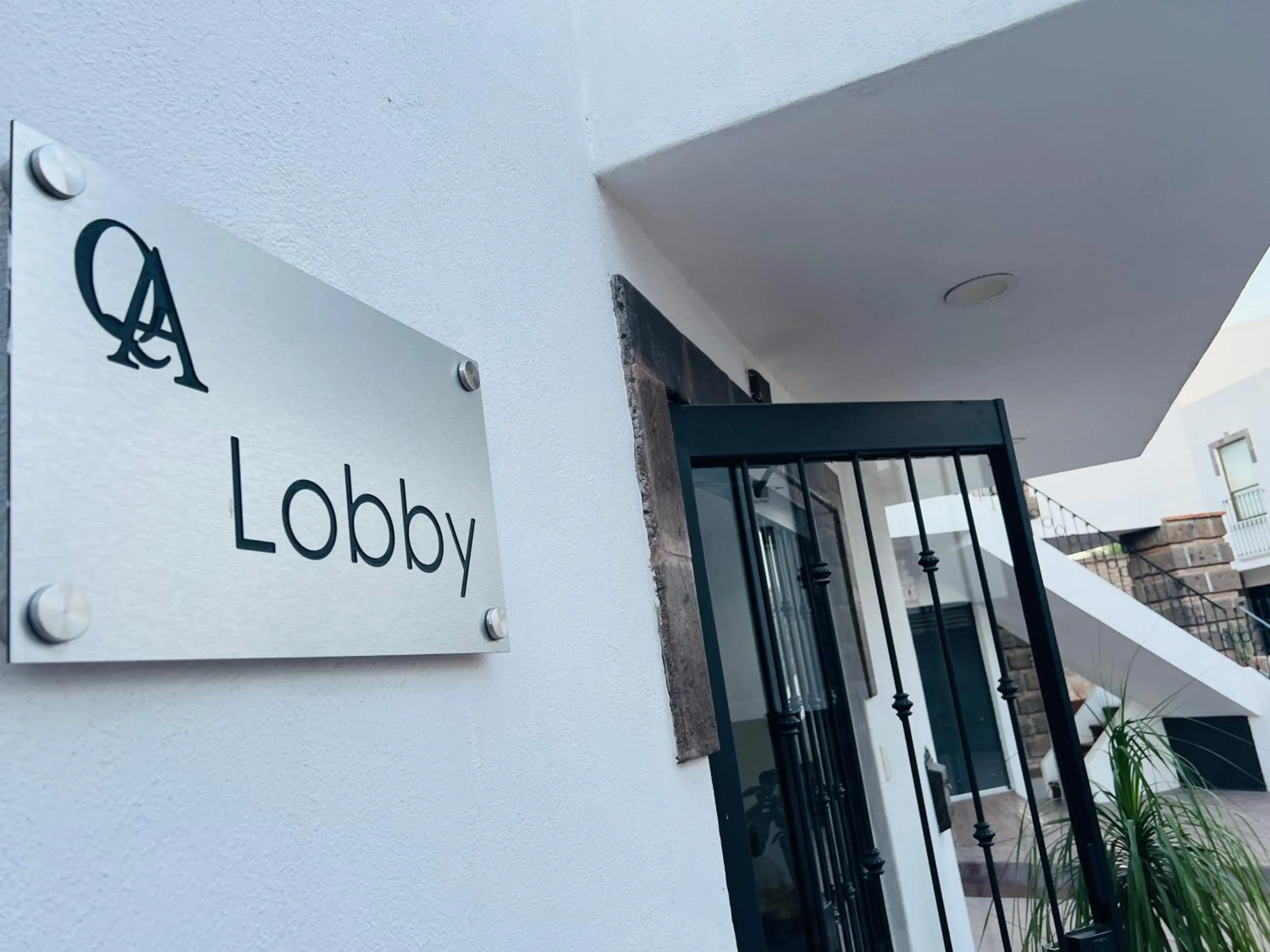 Lobby or reception in QA Hotel