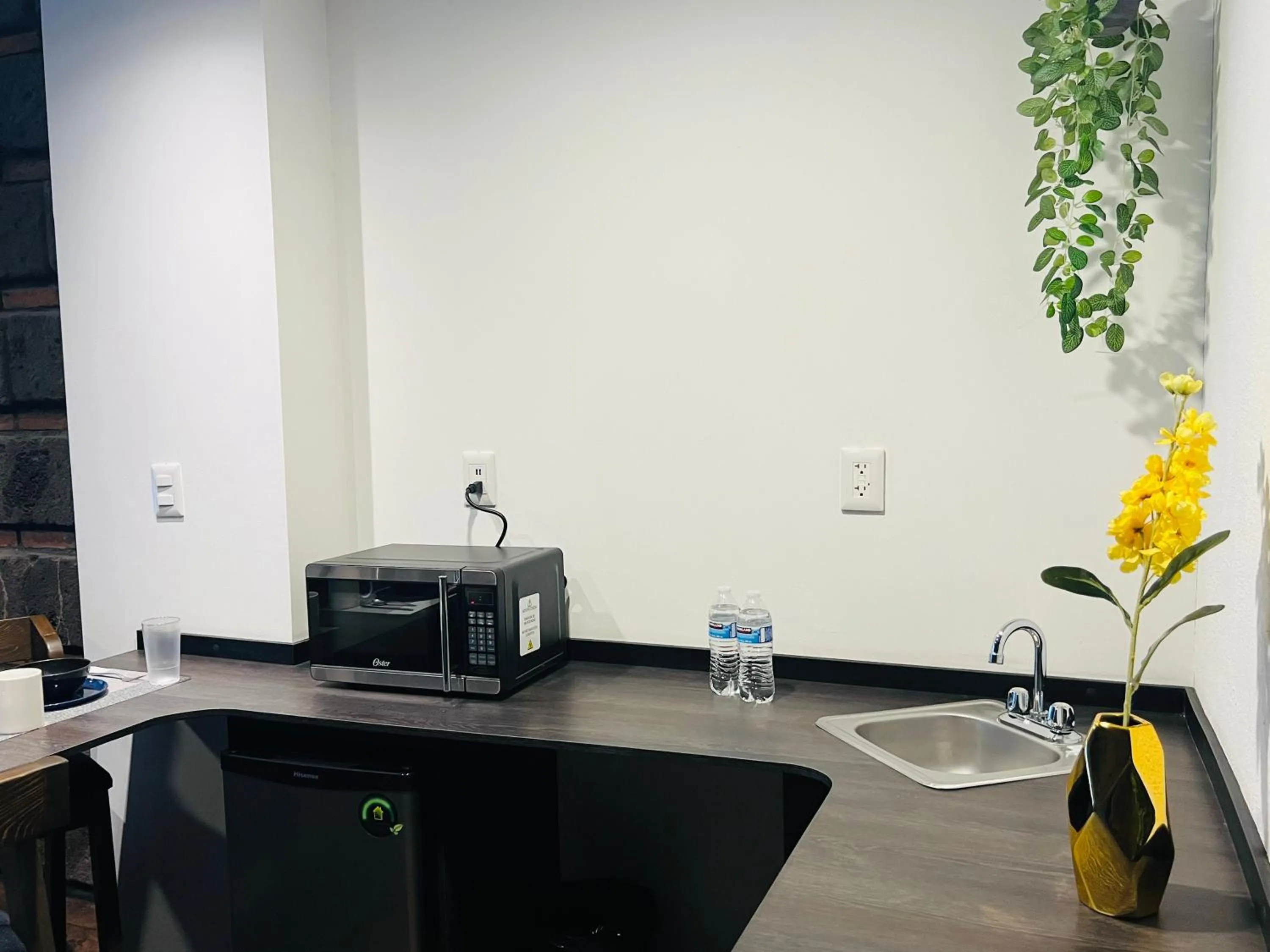 Kitchen or kitchenette in QA Hotel