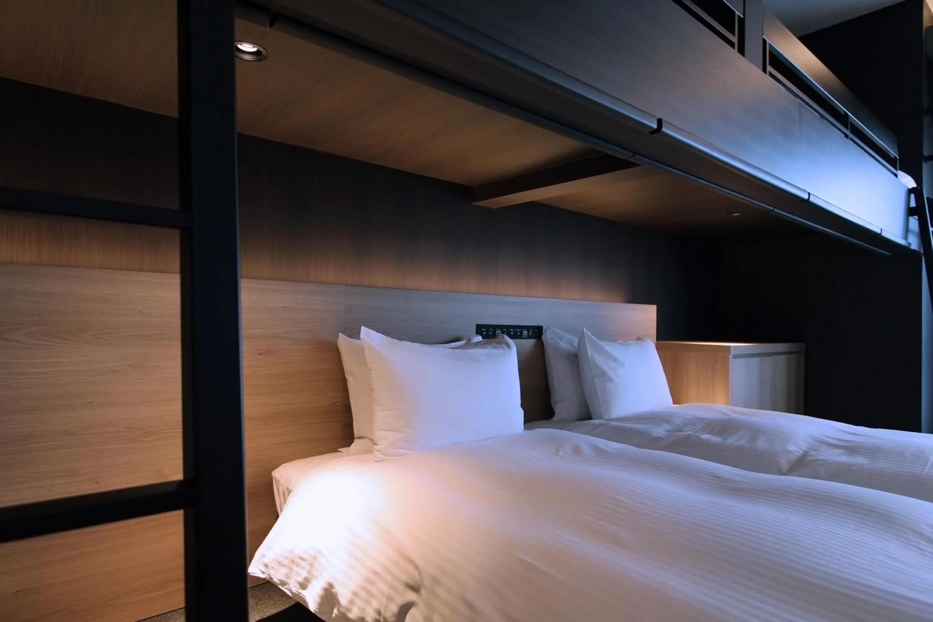 Bed in KOKO HOTEL Residence Kyoto Nijo Castle