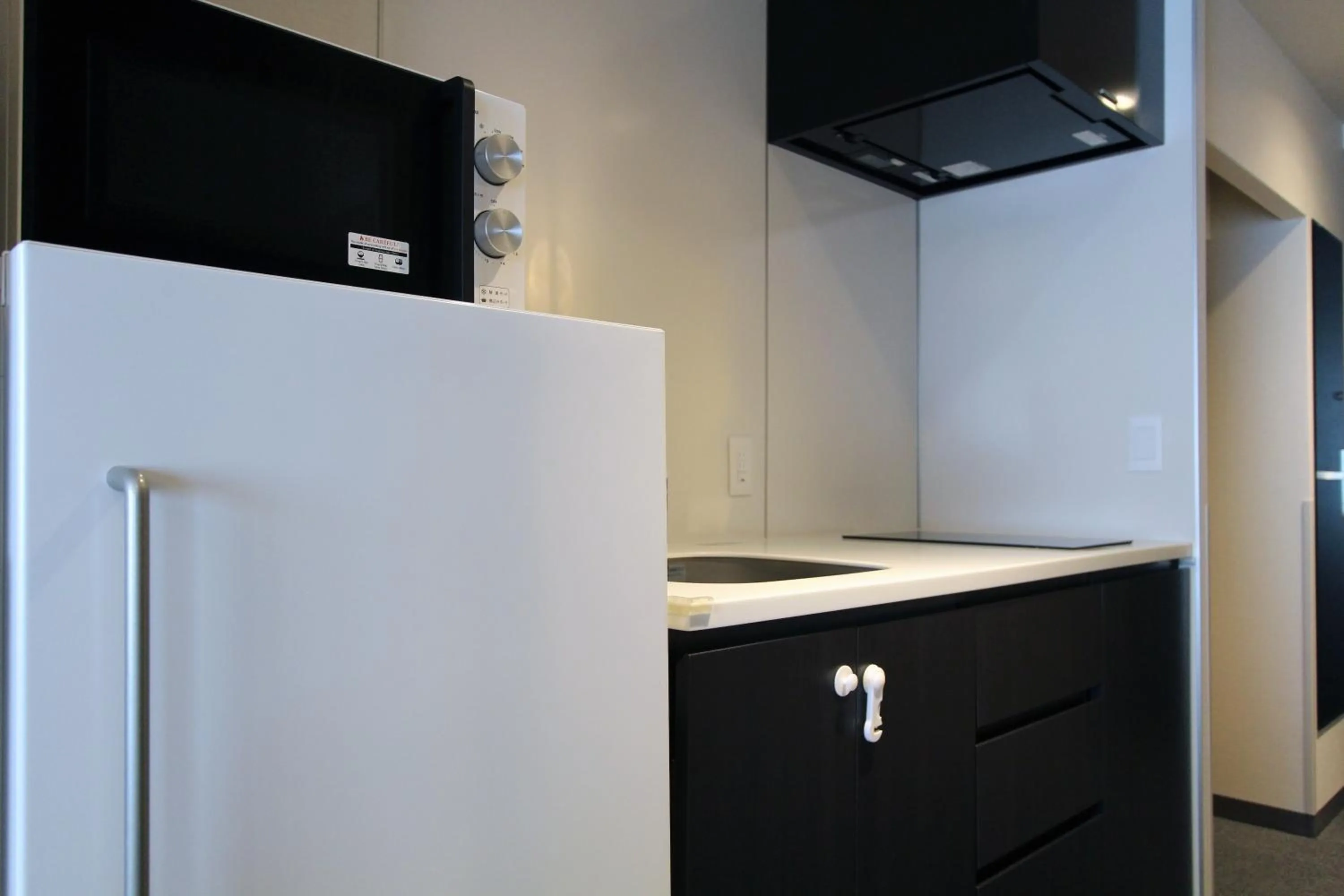 Kitchen or kitchenette in KOKO HOTEL Residence Kyoto Nijo Castle