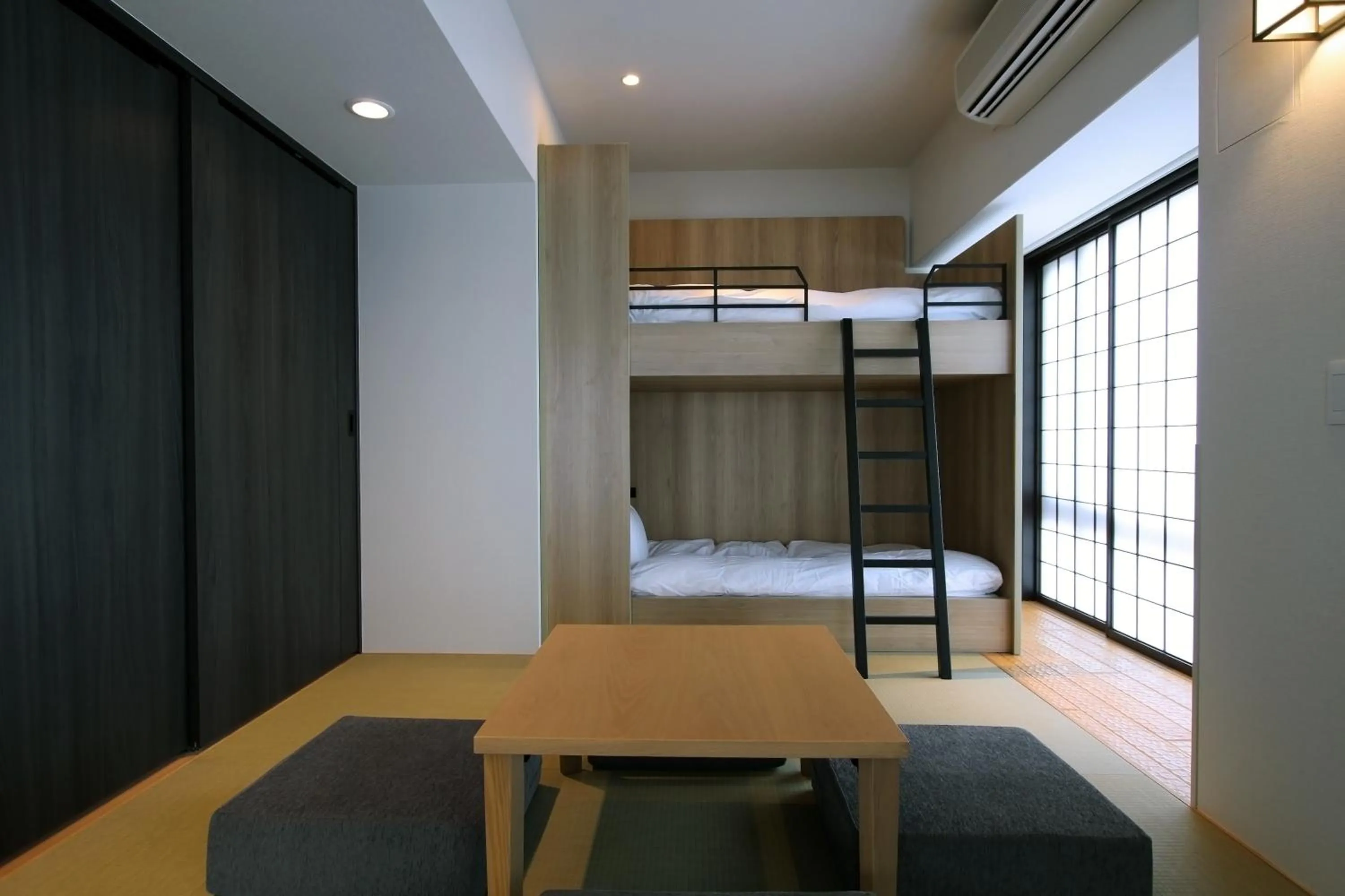 Bed in KOKO HOTEL Residence Kyoto Nijo Castle