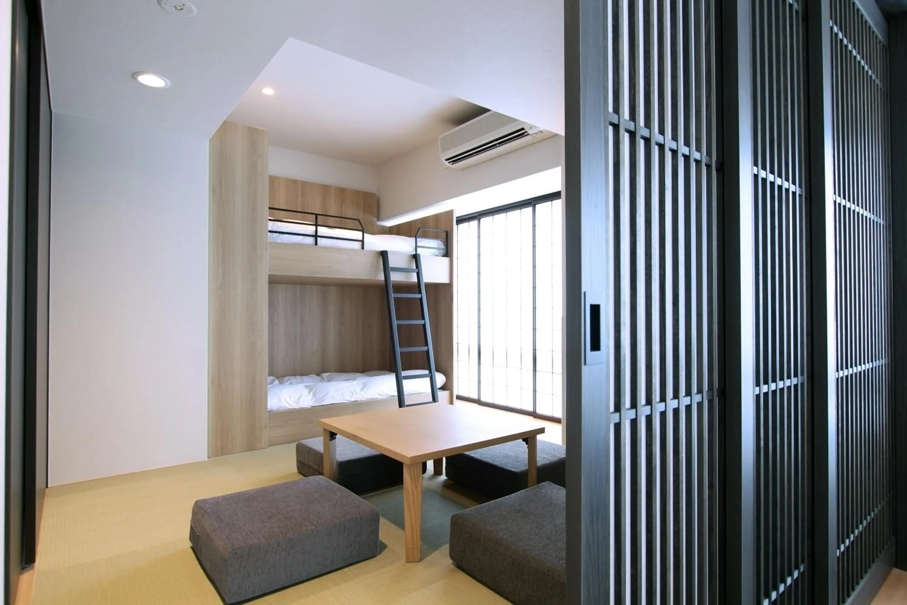 Bed in KOKO HOTEL Residence Kyoto Nijo Castle