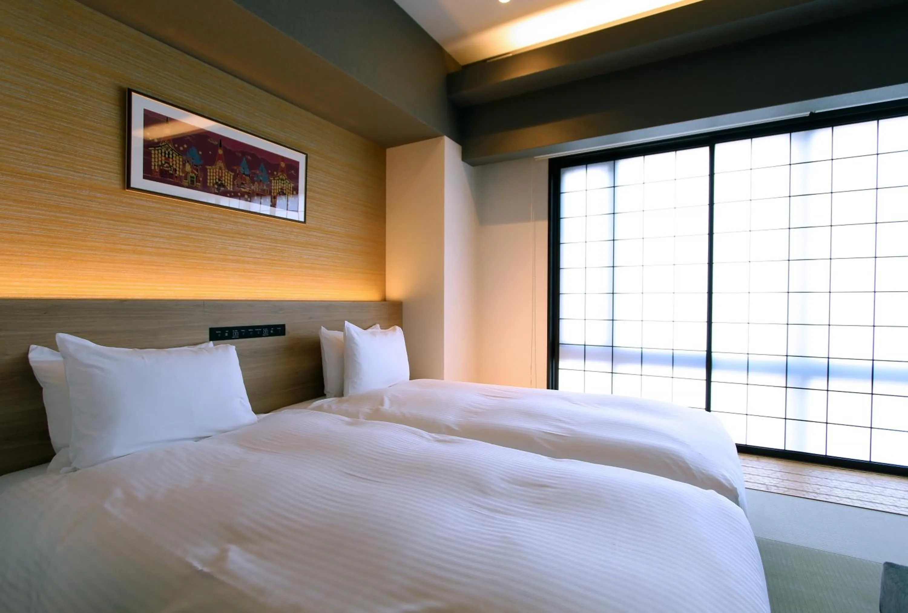 Bed in KOKO HOTEL Residence Kyoto Nijo Castle