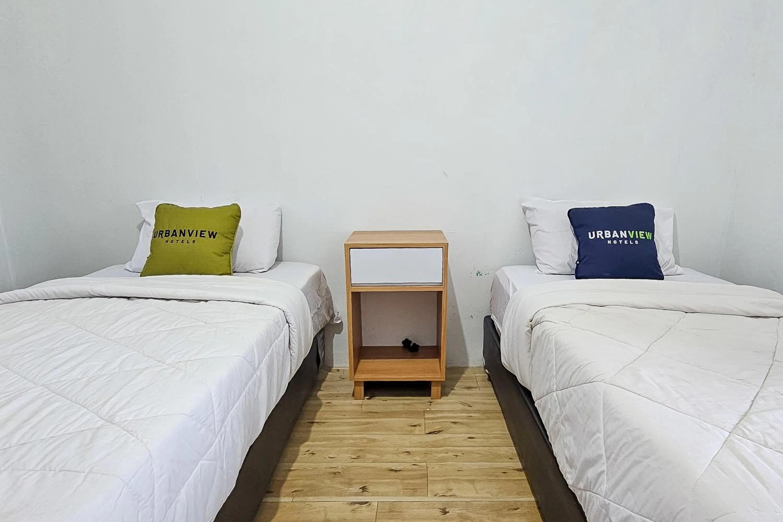 Bedroom, Bed in Urbanview Orchid Guest House