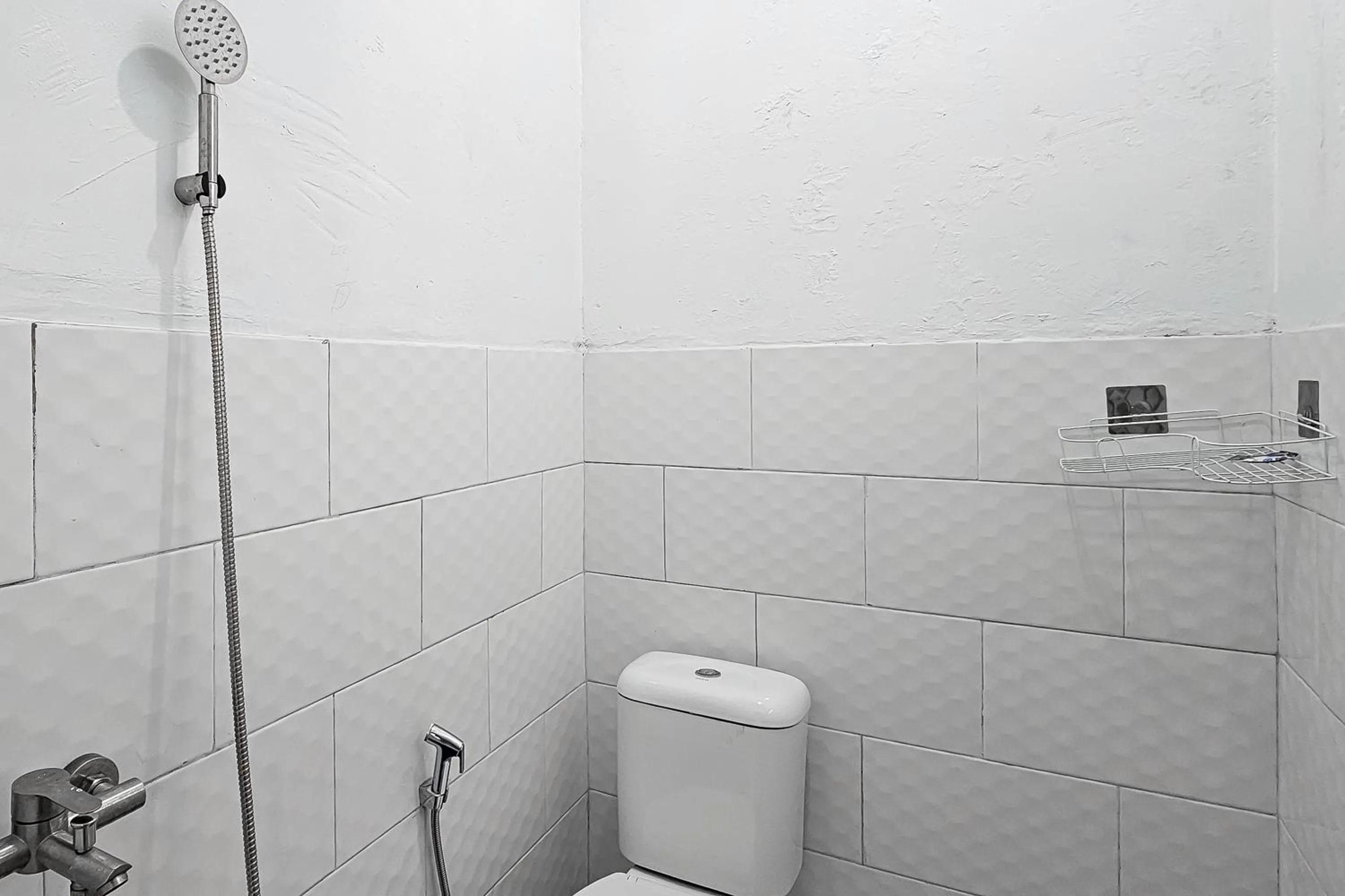 Bathroom in Urbanview Orchid Guest House