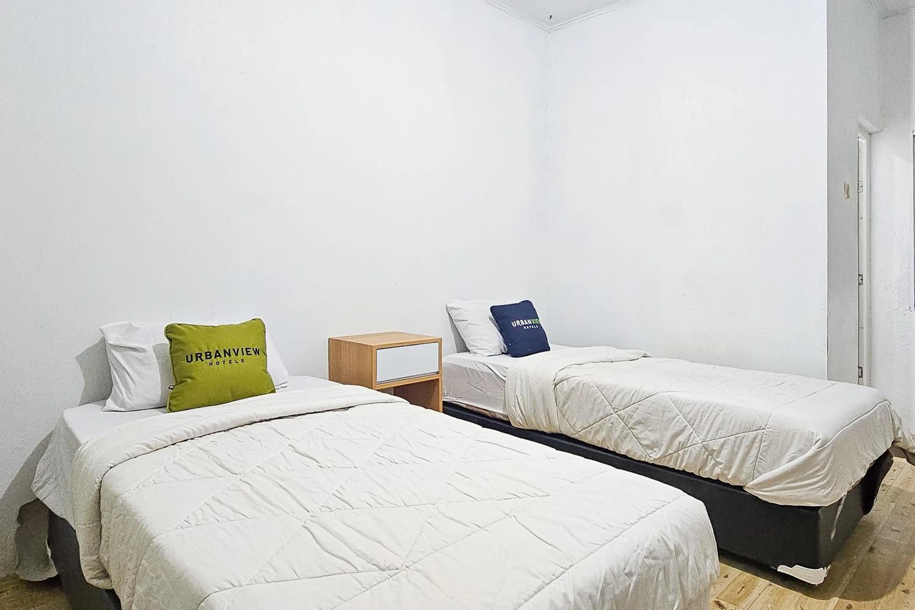 Bedroom, Bed in Urbanview Orchid Guest House