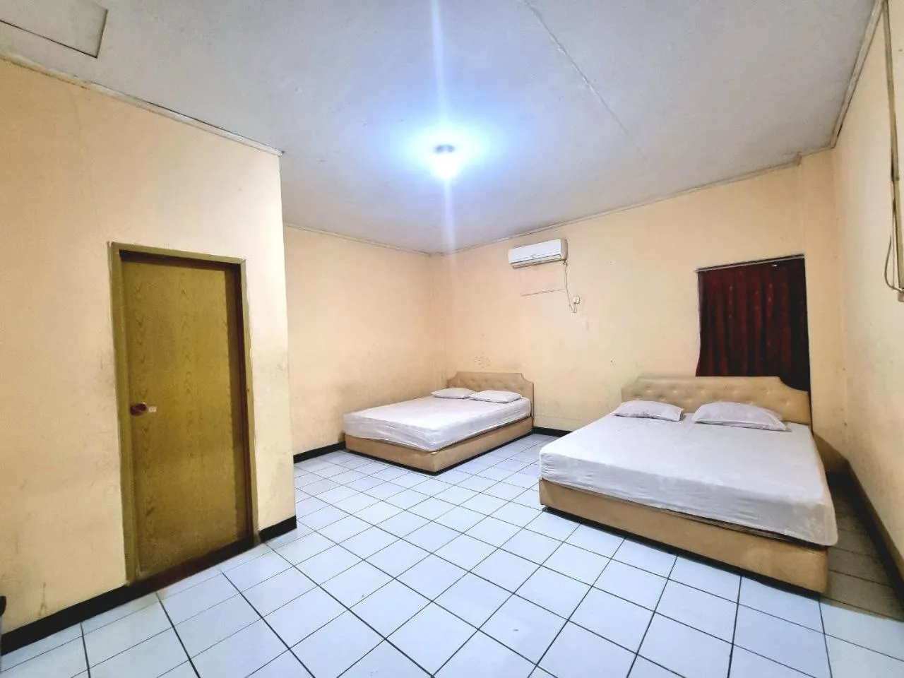 Bed in Hotel Harapan Jaya