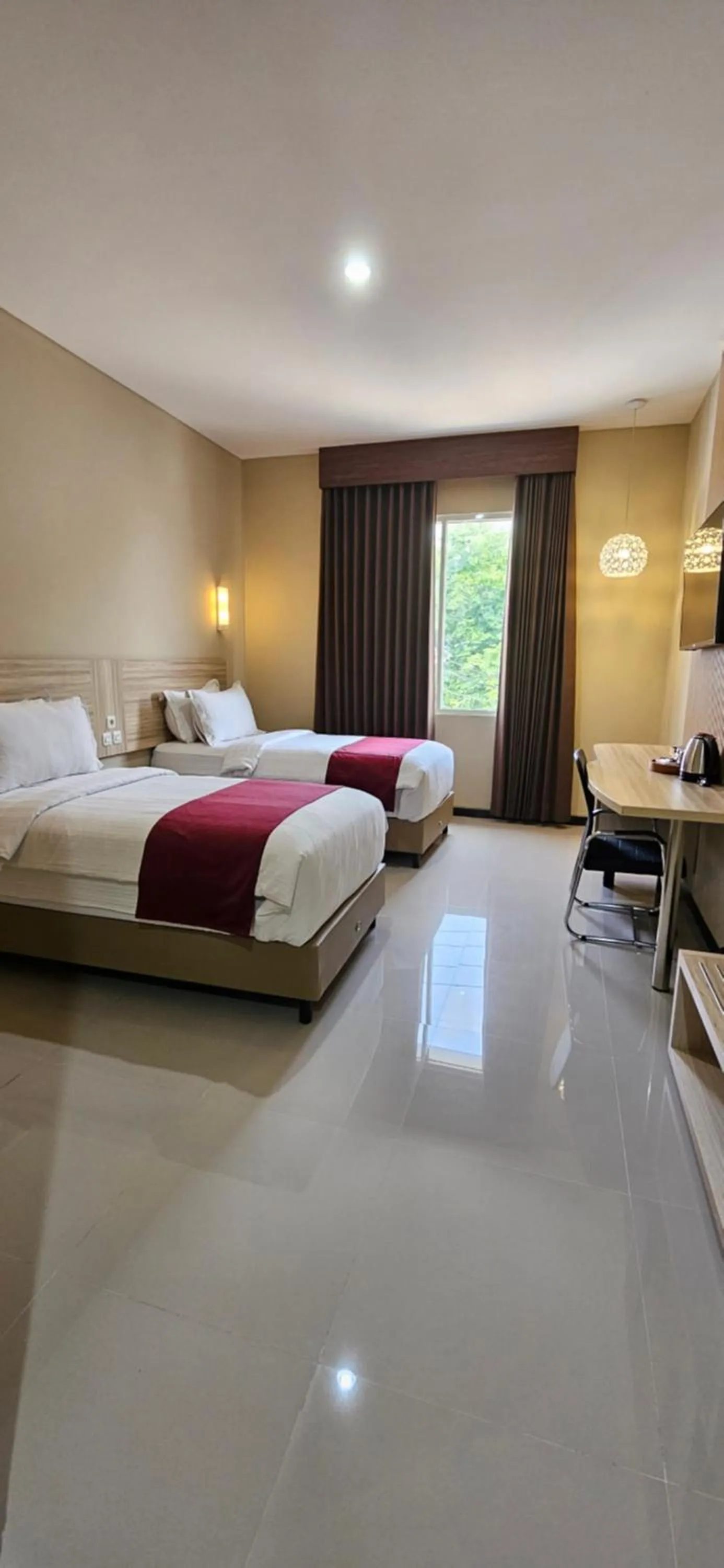 Bedroom, Bed in Sunflower Hotel Syariah near Juanda Airport