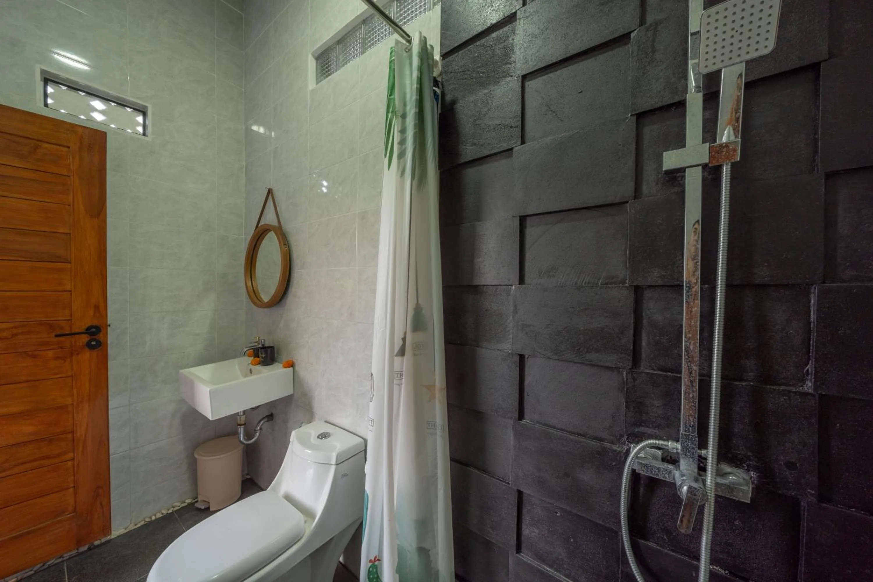 Bathroom in Wisana Villa Ubud by Dhananjaya Hospitality