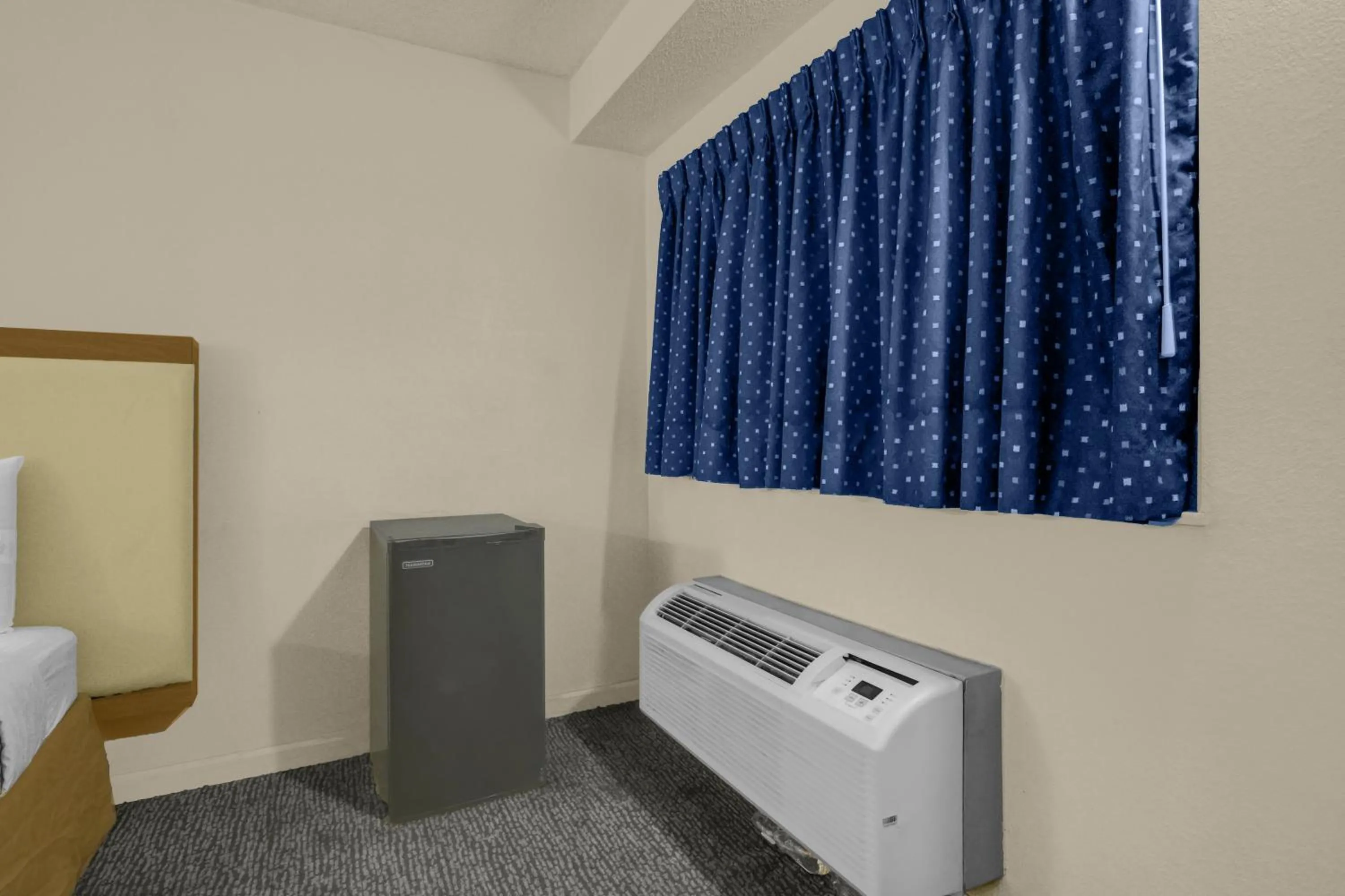 Bedroom in Brookville Inn By OYO Near Dayton International Airport