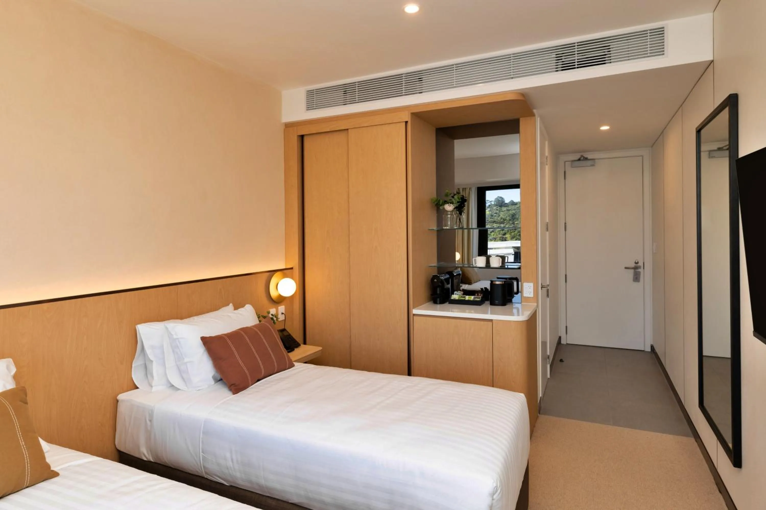 Bed in Maxim Hotel - Auckland