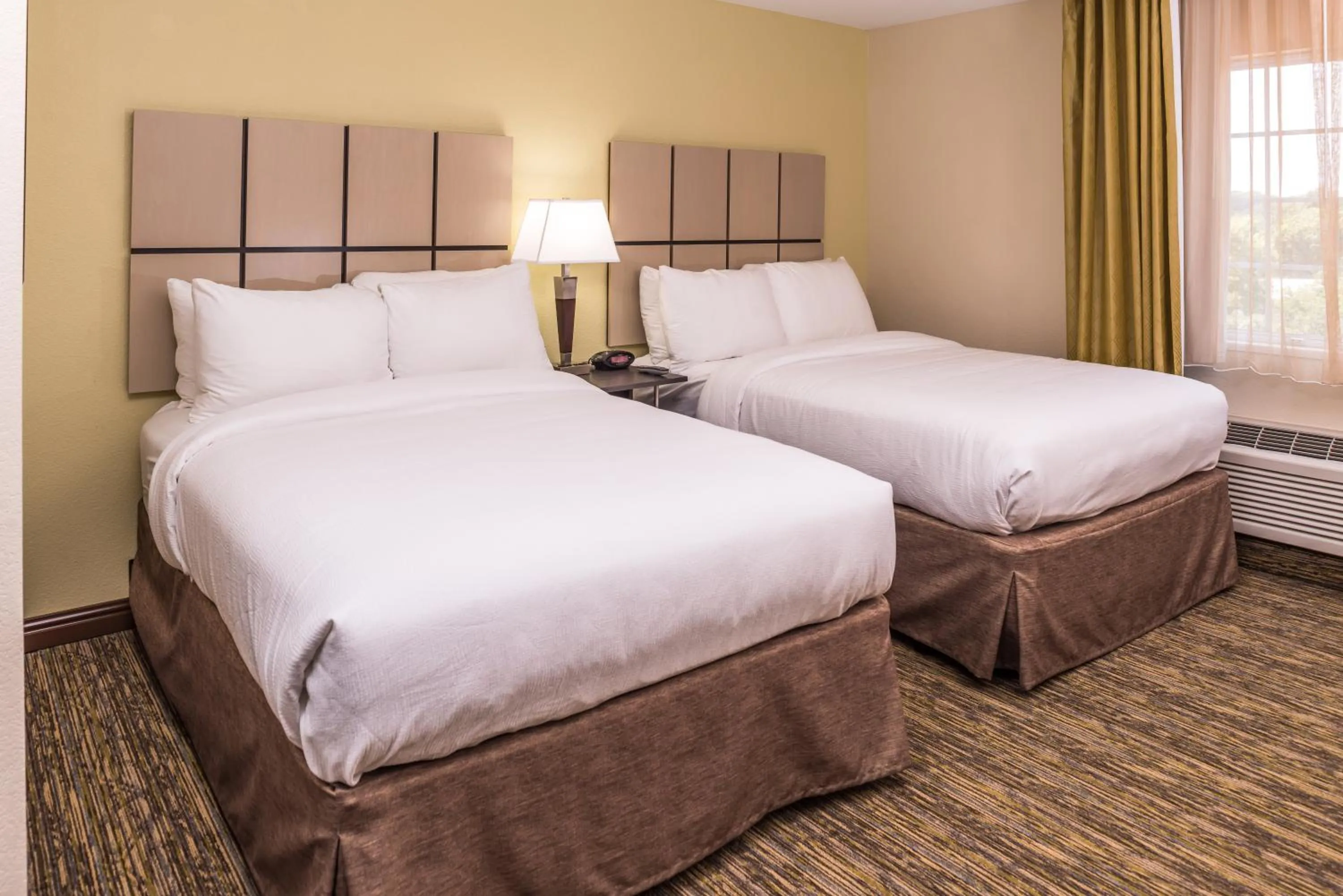 Bedroom, Bed in Candlewood Suites - Topeka West by IHG