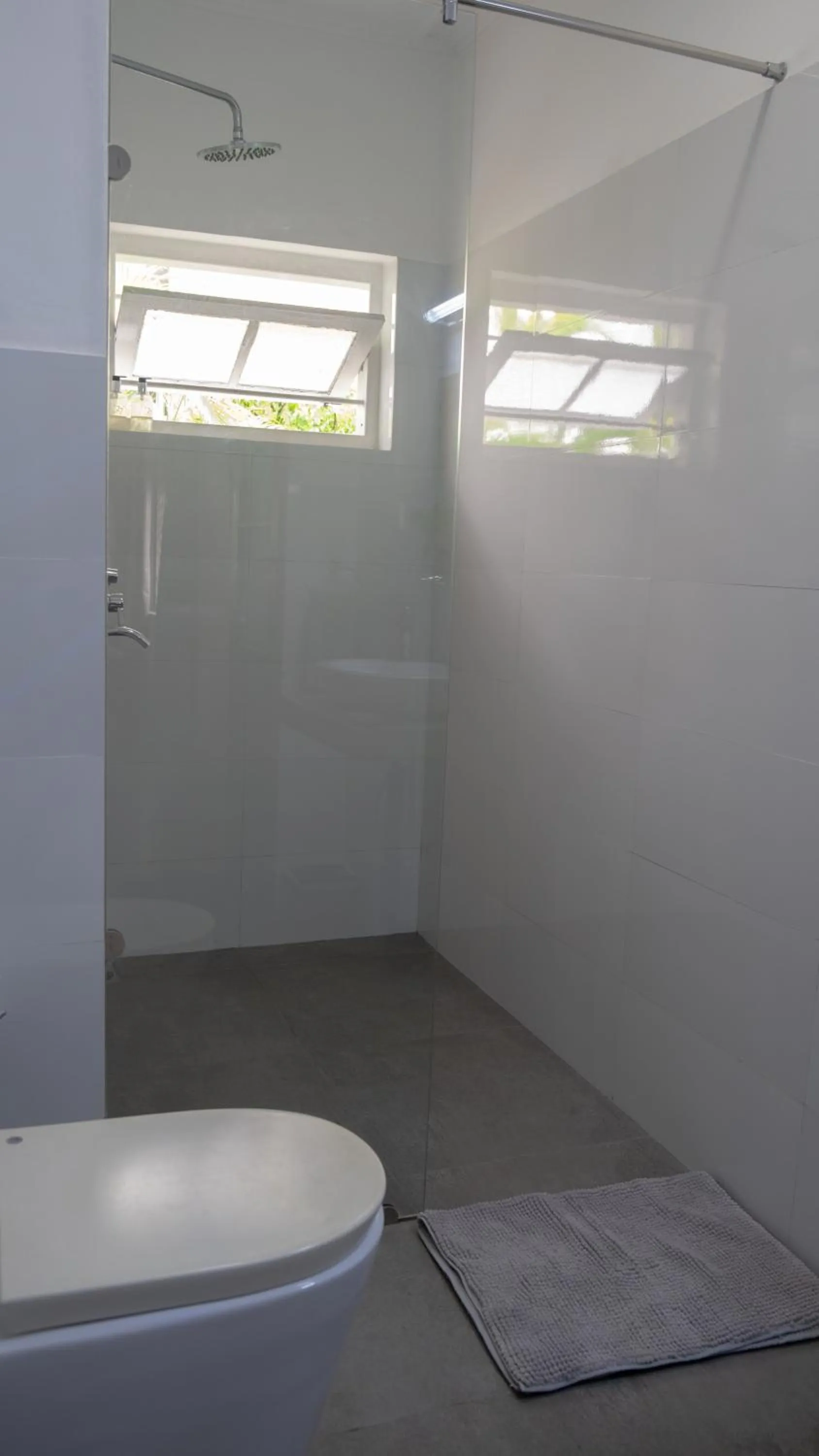 Bathroom in "27" Spathodea- Oasis in the City