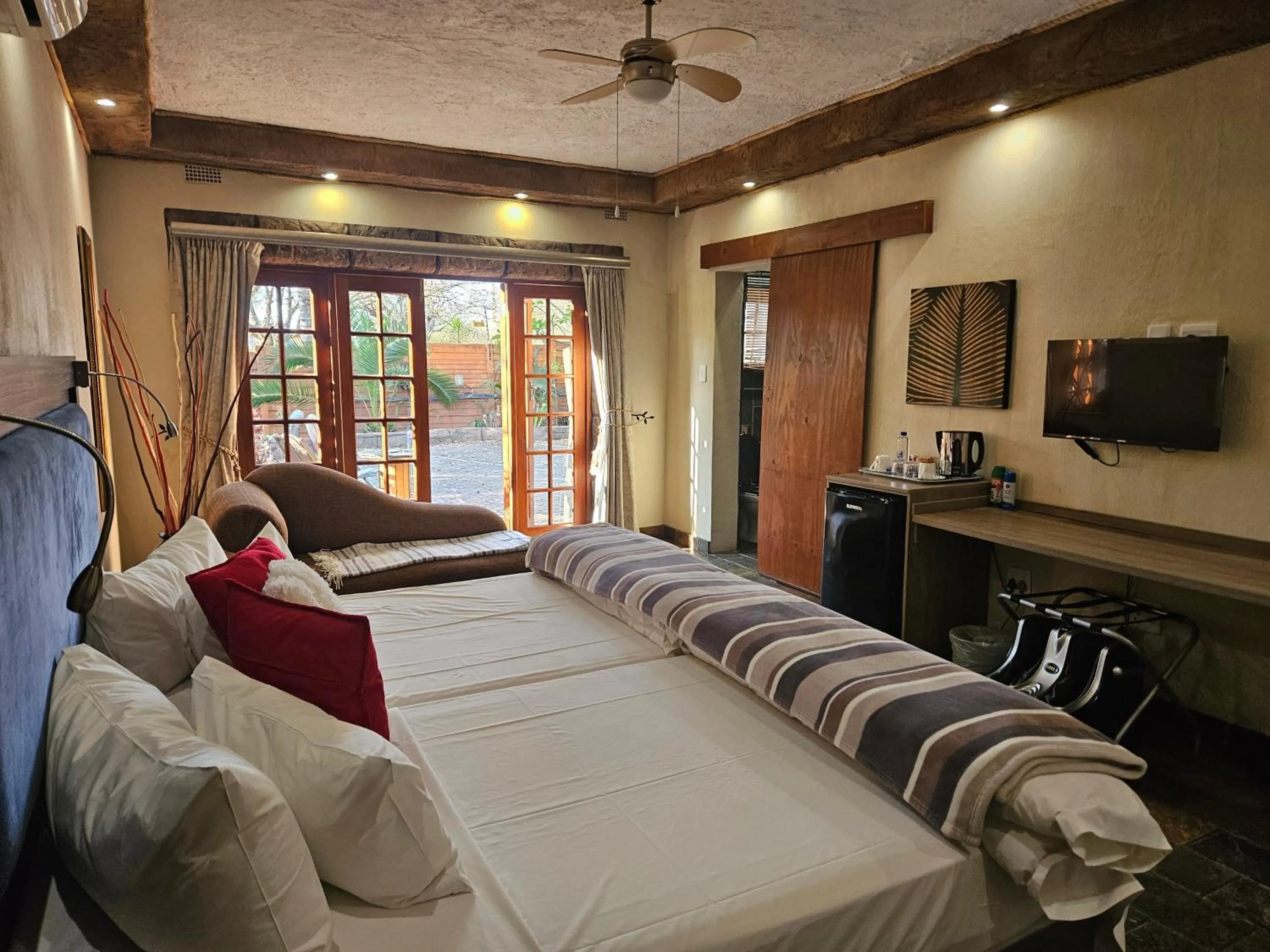 Bed in 61 On Ireland Guest House and Conferencing