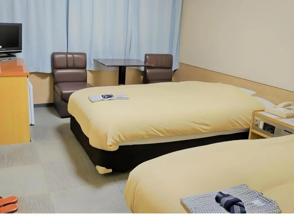 Bed in Ikebukuro Royal Hotel