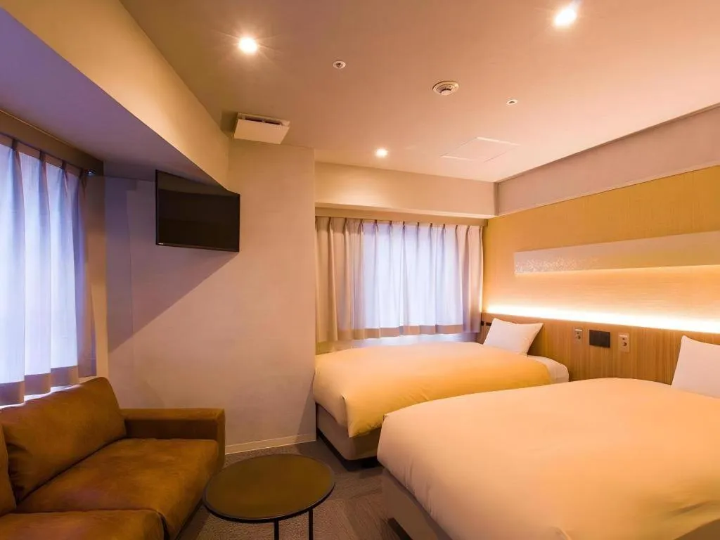 Bed in Ikebukuro Royal Hotel