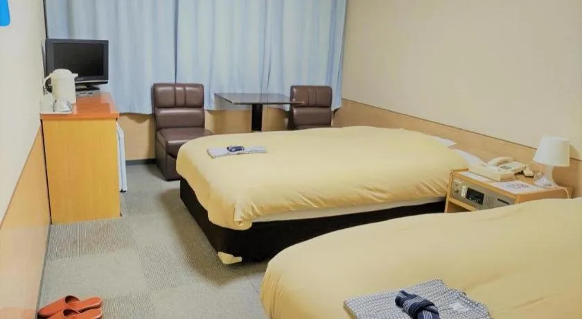 Bed in Ikebukuro Royal Hotel