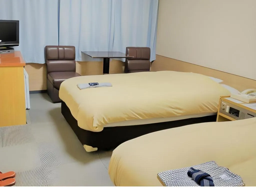 Bed in Ikebukuro Royal Hotel