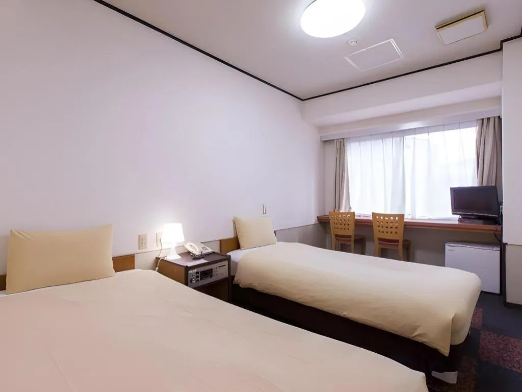 Bed in Ikebukuro Royal Hotel