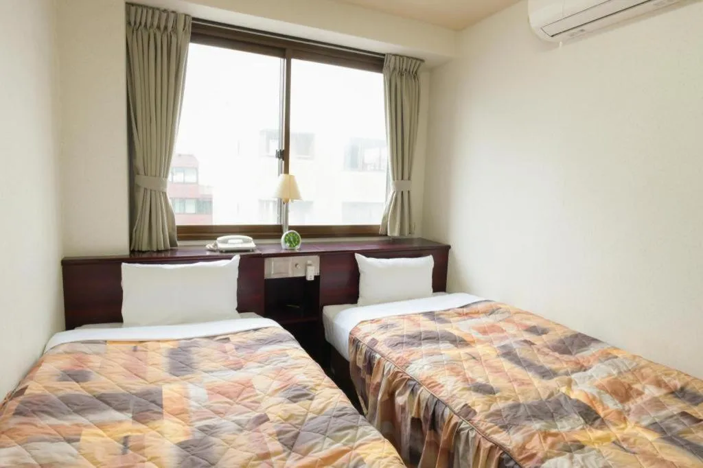 Bed in Business Hotel Shuttle