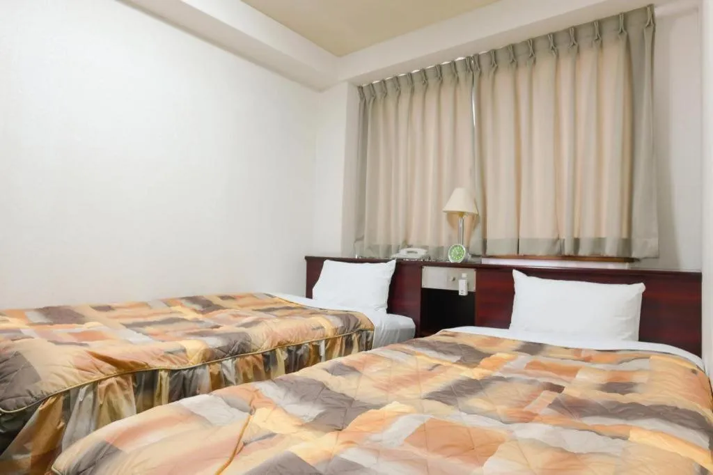 Bed in Business Hotel Shuttle