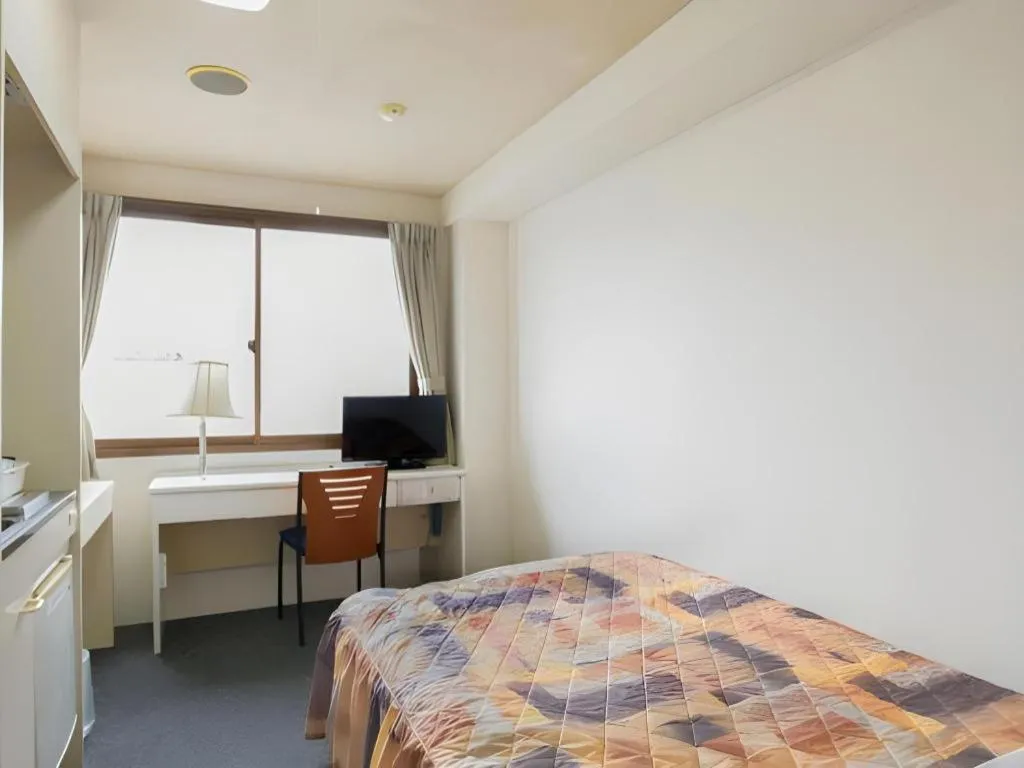 Bed in Business Hotel Shuttle