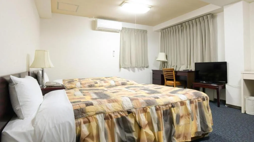 Bed in Business Hotel Shuttle