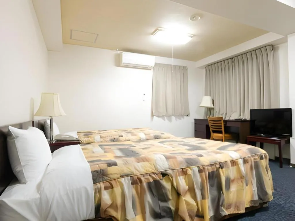 Bed in Business Hotel Shuttle