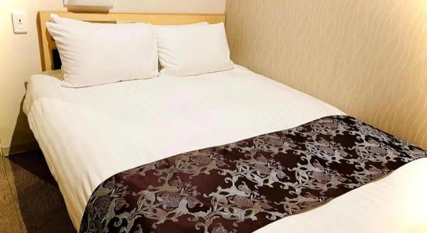 Bed in Hotel Suave Shibuya