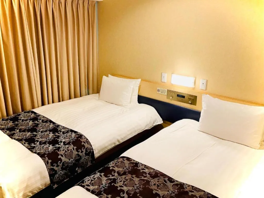 Bed in Hotel Suave Shibuya